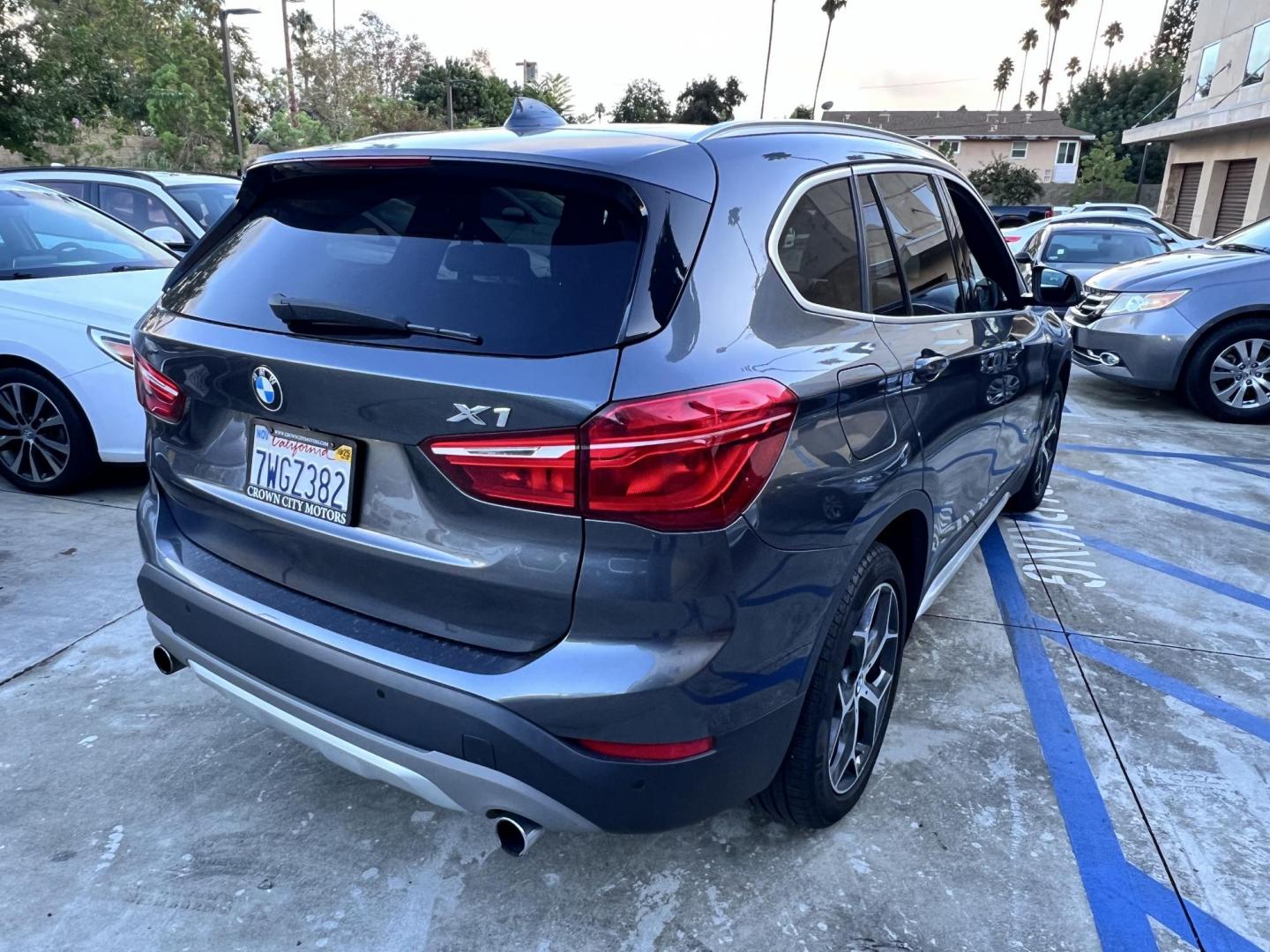 2017 BMW X1 sDrive28i (WBXHU7C36HP) with an 2.0L L4 DOHC 16V engine, 8A transmission, located at 30 S. Berkeley Avenue, Pasadena, CA, 91107, (626) 248-7567, 34.145447, -118.109398 - Photo#4