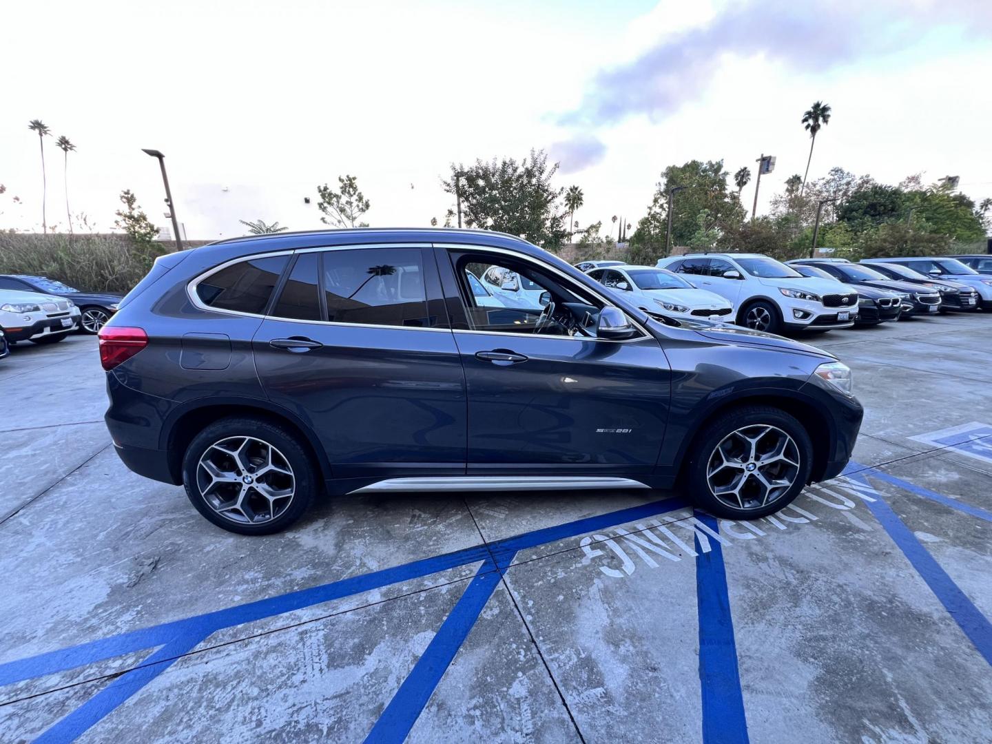 2017 BMW X1 sDrive28i (WBXHU7C36HP) with an 2.0L L4 DOHC 16V engine, 8A transmission, located at 30 S. Berkeley Avenue, Pasadena, CA, 91107, (626) 248-7567, 34.145447, -118.109398 - Photo#5