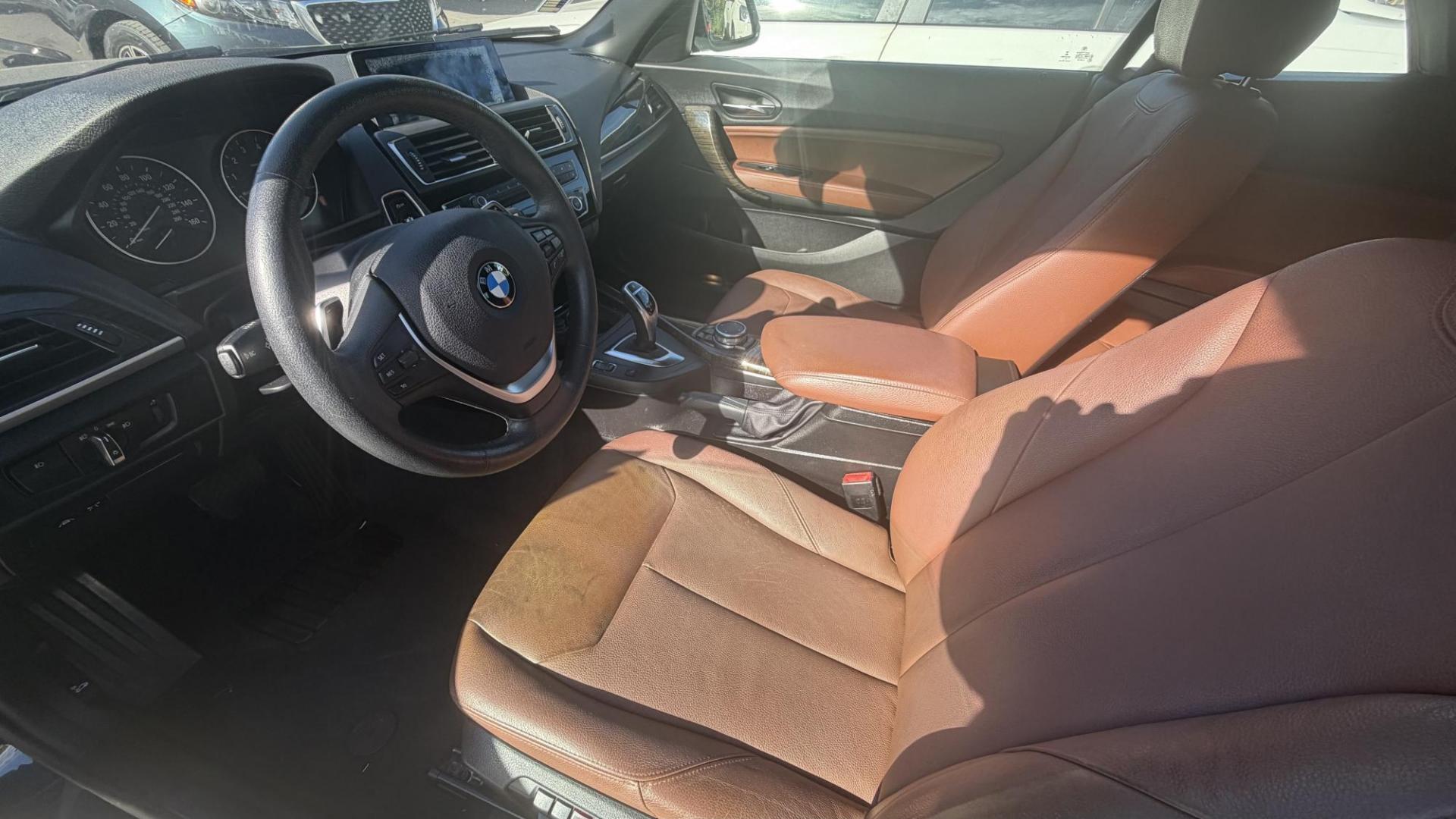 2015 Atlantis Metallic /Black BMW 2-Series 228xi Convertible (WBA1K7C54FV) with an 2.0L L4 DOHC 16V engine, 8A transmission, located at 30 S. Berkeley Avenue, Pasadena, CA, 91107, (626) 248-7567, 34.145447, -118.109398 - 2015 BMW 228i Convertible – Atlantis Metallic | Luxury, Style & Easy Financing in Pasadena Turn heads wherever you go in this stunning 2015 BMW 228i Convertible, finished in rare Atlantis Metallic, a gorgeous blue-green color that shifts beautifully in the sunlight. With its black leather inter - Photo#9
