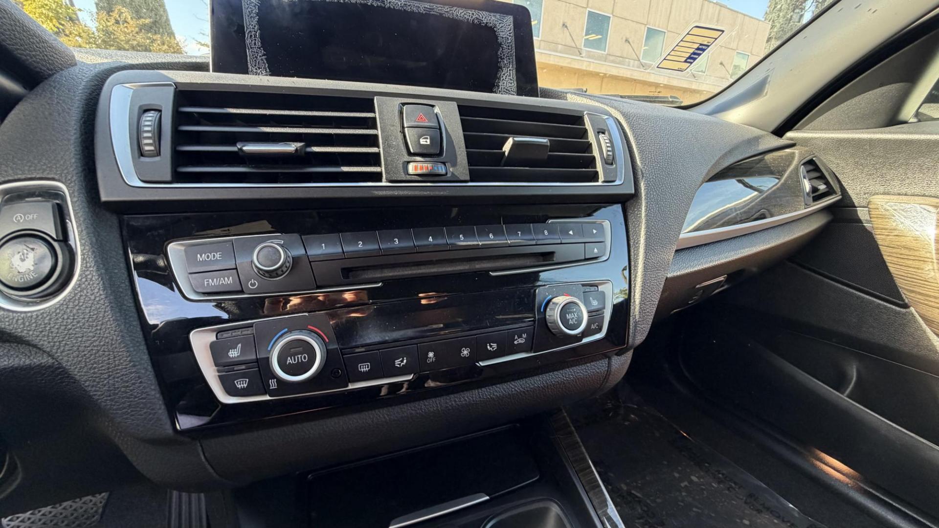 2015 Atlantis Metallic /Black BMW 2-Series 228xi Convertible (WBA1K7C54FV) with an 2.0L L4 DOHC 16V engine, 8A transmission, located at 30 S. Berkeley Avenue, Pasadena, CA, 91107, (626) 248-7567, 34.145447, -118.109398 - 2015 BMW 228i Convertible – Atlantis Metallic | Luxury, Style & Easy Financing in Pasadena Turn heads wherever you go in this stunning 2015 BMW 228i Convertible, finished in rare Atlantis Metallic, a gorgeous blue-green color that shifts beautifully in the sunlight. With its black leather inter - Photo#11