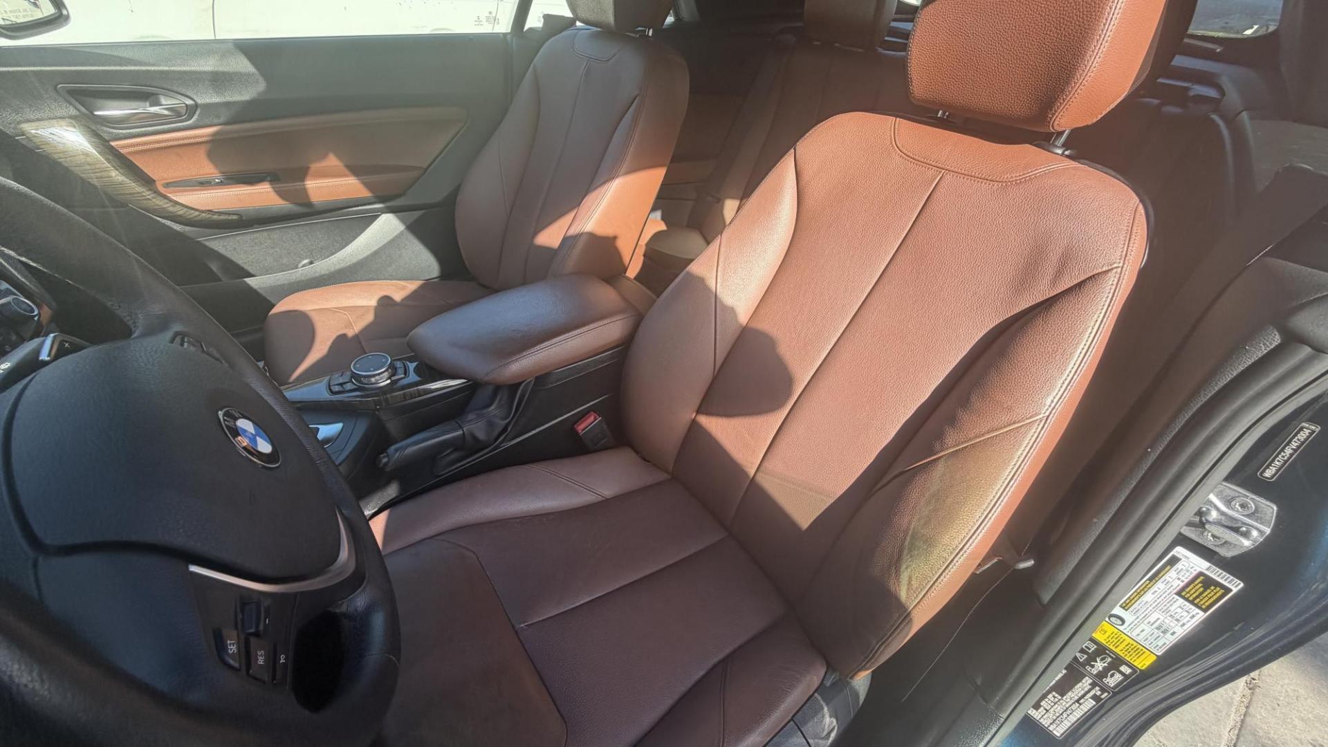 2015 Atlantis Metallic /Black BMW 2-Series 228xi Convertible (WBA1K7C54FV) with an 2.0L L4 DOHC 16V engine, 8A transmission, located at 30 S. Berkeley Avenue, Pasadena, CA, 91107, (626) 248-7567, 34.145447, -118.109398 - 2015 BMW 228i Convertible – Atlantis Metallic | Luxury, Style & Easy Financing in Pasadena Turn heads wherever you go in this stunning 2015 BMW 228i Convertible, finished in rare Atlantis Metallic, a gorgeous blue-green color that shifts beautifully in the sunlight. With its black leather inter - Photo#13