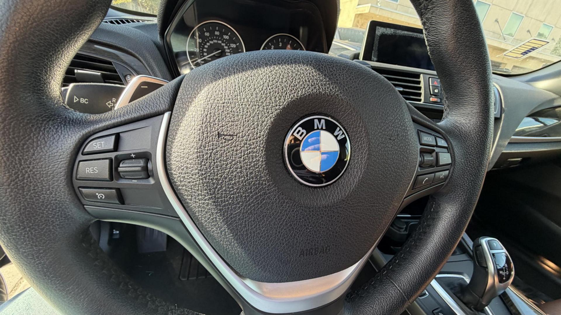 2015 Atlantis Metallic /Black BMW 2-Series 228xi Convertible (WBA1K7C54FV) with an 2.0L L4 DOHC 16V engine, 8A transmission, located at 30 S. Berkeley Avenue, Pasadena, CA, 91107, (626) 248-7567, 34.145447, -118.109398 - 2015 BMW 228i Convertible – Atlantis Metallic | Luxury, Style & Easy Financing in Pasadena Turn heads wherever you go in this stunning 2015 BMW 228i Convertible, finished in rare Atlantis Metallic, a gorgeous blue-green color that shifts beautifully in the sunlight. With its black leather inter - Photo#15