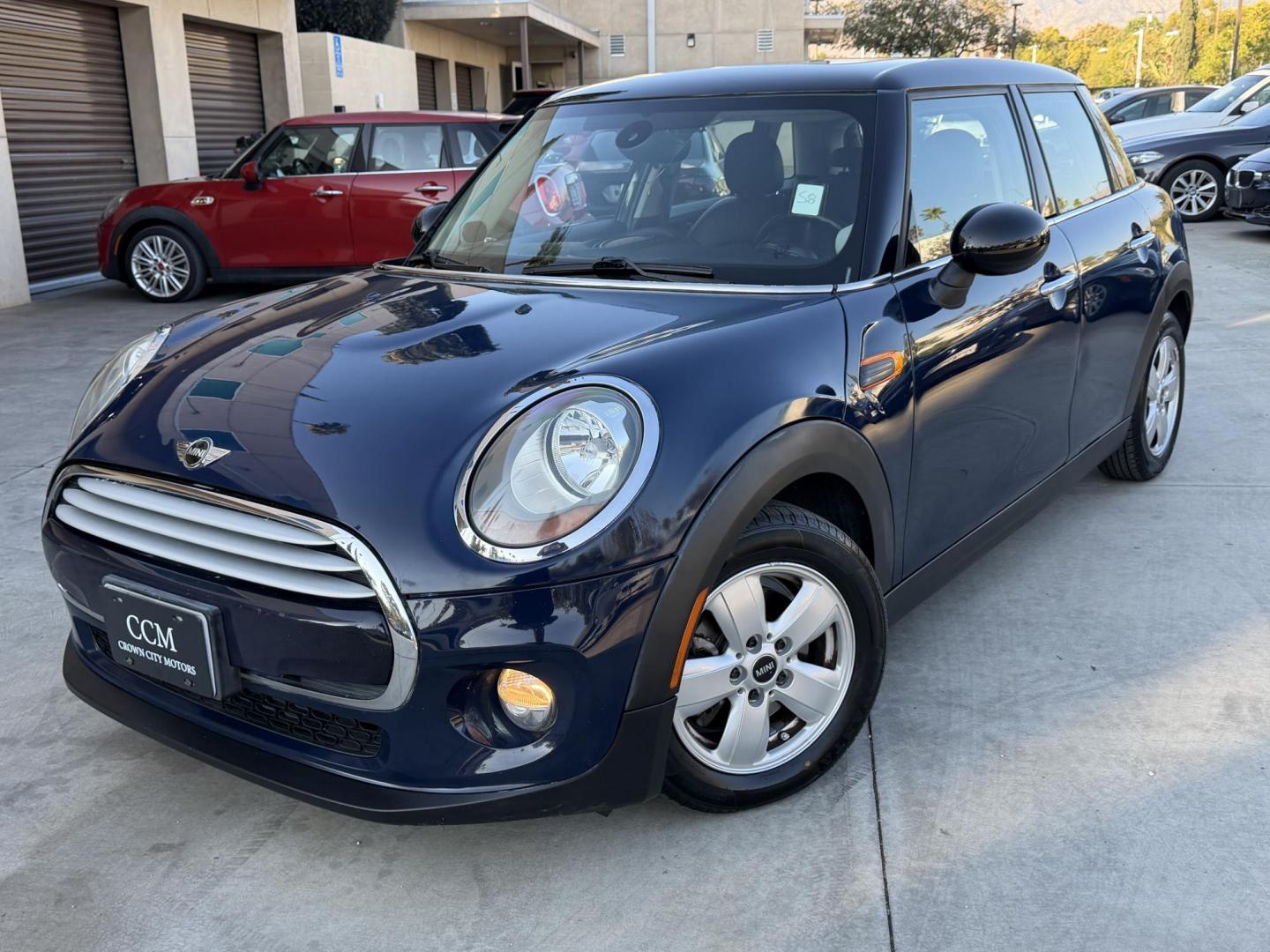 2015 Deep Blue Metallic /Black Mini Cooper Base (WMWXS5C50FT) with an 1.5L L3 engine, Automatic transmission, located at 30 S. Berkeley Avenue, Pasadena, CA, 91107, (626) 248-7567, 34.145447, -118.109398 - 2015 MINI Cooper Hardtop – Deep Blue Metallic | Style, Efficiency & Easy Financing in Pasadena Drive away in this stylish and fun-to-drive 2015 MINI Cooper Hardtop, finished in stunning Deep Blue Metallic with a black interior. Compact, sporty, and full of character, this MINI delivers world-cl - Photo#0
