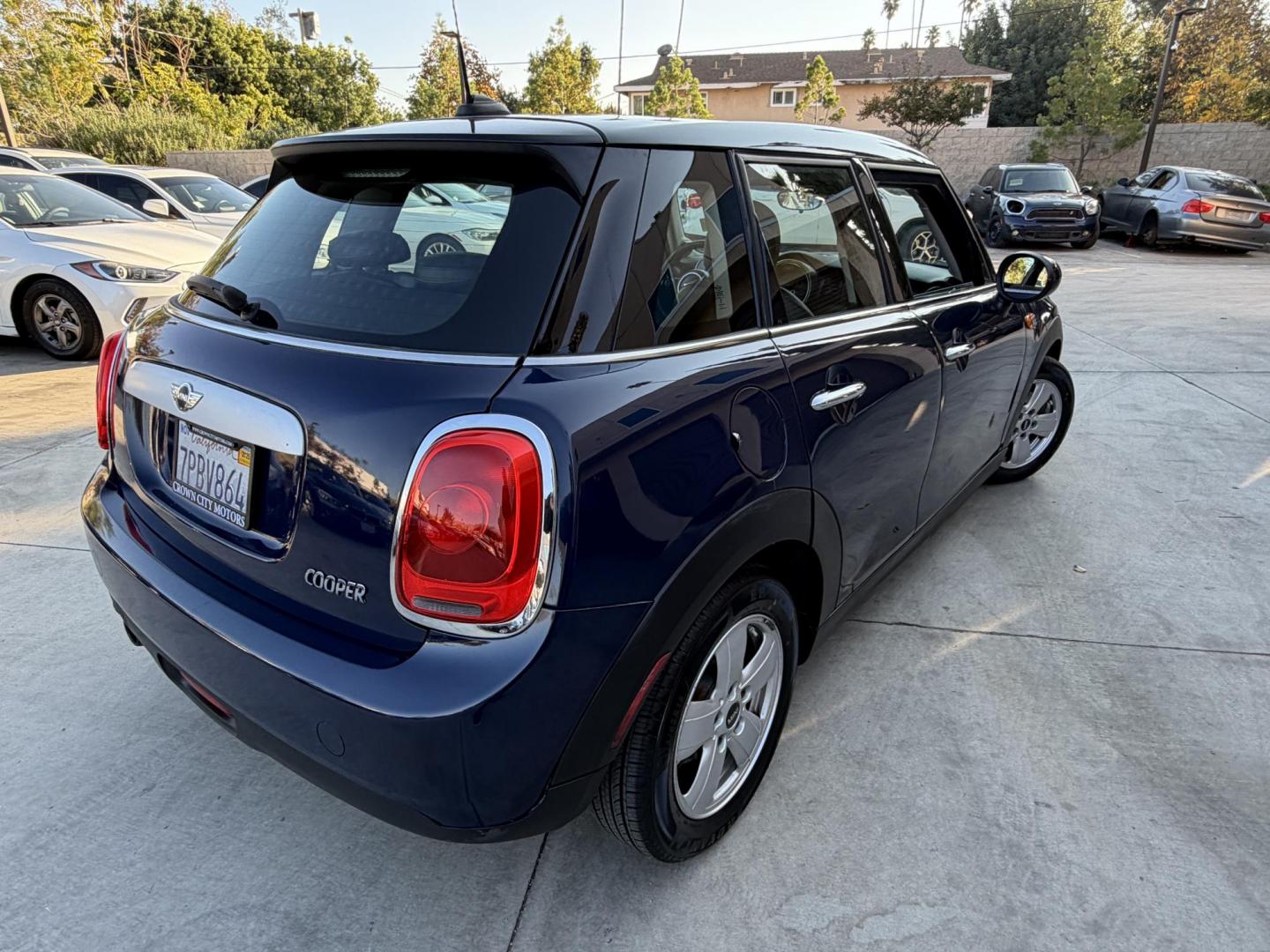 2015 Deep Blue Metallic /Black Mini Cooper Base (WMWXS5C50FT) with an 1.5L L3 engine, Automatic transmission, located at 30 S. Berkeley Avenue, Pasadena, CA, 91107, (626) 248-7567, 34.145447, -118.109398 - 2015 MINI Cooper Hardtop – Deep Blue Metallic | Style, Efficiency & Easy Financing in Pasadena Drive away in this stylish and fun-to-drive 2015 MINI Cooper Hardtop, finished in stunning Deep Blue Metallic with a black interior. Compact, sporty, and full of character, this MINI delivers world-cl - Photo#6