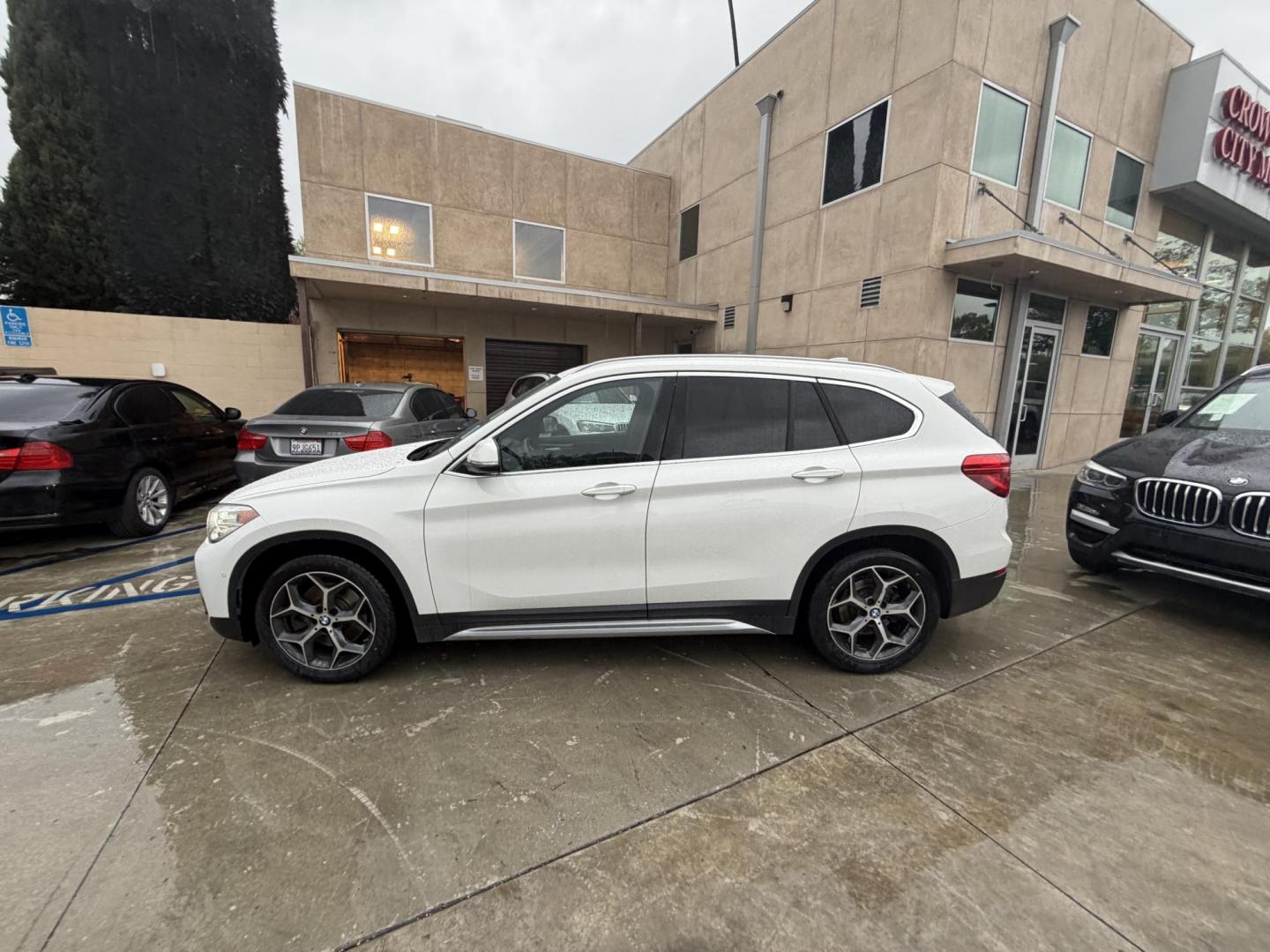2019 BMW X1 xDrive28i (WBXHT3C50K3) with an 2.0L L4 DOHC 16V engine, 8A transmission, located at 30 S. Berkeley Avenue, Pasadena, CA, 91107, (626) 248-7567, 34.145447, -118.109398 - 2019 BMW X1 – White Exterior / Black Interior – Buy Here Pay Here Pasadena Experience luxury, performance, and practicality in one sleek package with this 2019 BMW X1 (VIN WBXHT3C50K3H34275) — finished in a crisp white exterior over a refined black interior. This compact BMW SUV delivers Eu - Photo#1