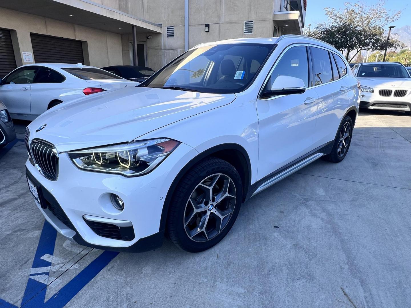 2016 White /Black BMW X1 xDrive28i (WBXHT3C38GP) with an 2.0L L4 DOHC 16V engine, 8A transmission, located at 30 S. Berkeley Avenue, Pasadena, CA, 91107, (626) 248-7567, 34.145447, -118.109398 - Photo#0