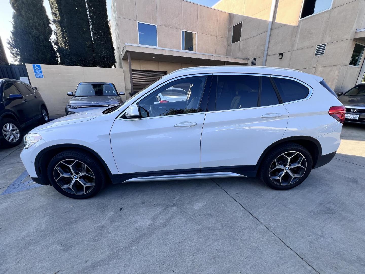 2016 White /Black BMW X1 xDrive28i (WBXHT3C38GP) with an 2.0L L4 DOHC 16V engine, 8A transmission, located at 30 S. Berkeley Avenue, Pasadena, CA, 91107, (626) 248-7567, 34.145447, -118.109398 - Photo#1