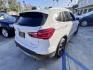 2016 White /Black BMW X1 xDrive28i (WBXHT3C38GP) with an 2.0L L4 DOHC 16V engine, 8A transmission, located at 30 S. Berkeley Avenue, Pasadena, CA, 91107, (626) 248-7567, 34.145447, -118.109398 - 2016 BMW X1 xDrive28i – White / Black Interior – Buy Here Pay Here Pasadena Luxury, performance, and practicality come together in this 2016 BMW X1 xDrive28i (VIN WBXHT3C38GP885411) featuring a white exterior over a black interior. This compact luxury SUV offers premium comfort, spirited perf - Photo#4