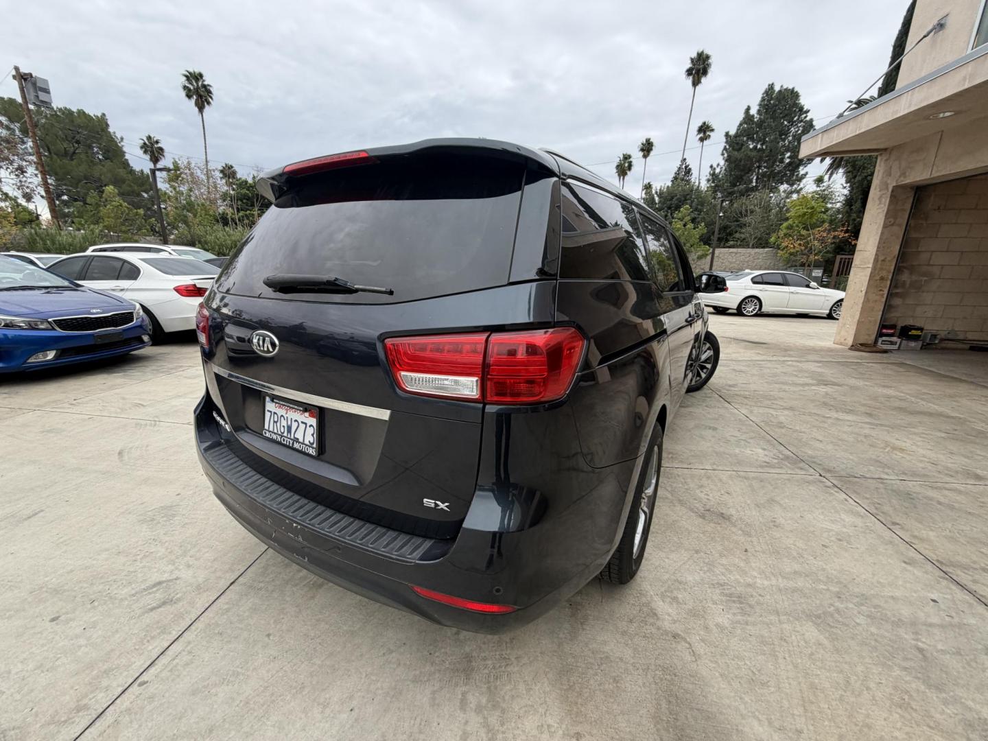 2016 Space Gray Metallic /Gray Kia Sedona EX (KNDMC5C18G6) with an 3.3L V6 DOHC 24V engine, 6-Speed Automatic transmission, located at 30 S. Berkeley Avenue, Pasadena, CA, 91107, (626) 248-7567, 34.145447, -118.109398 - Photo#2