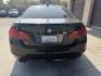 2015 Black /BLACK BMW 5-Series 528i (WBA5A5C53FD) with an 2.0L L4 DOHC 16V TURBO engine, 8-Speed Automatic transmission, located at 30 S. Berkeley Avenue, Pasadena, CA, 91107, (626) 248-7567, 34.145447, -118.109398 - Crown City Motors is a used “Buy Here Pay Here” car dealer in Pasadena CA. “Buy Here Pay Here” financing, means that when you purchase your vehicle from our dealership, that you make the payments to the dealership as well. We do not need the banks approval to get you approved for a used auto - Photo#3