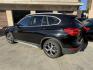 2018 Black /Black BMW X1 xDrive28i (WBXHT3C35J5) with an 2.0L L4 DOHC 16V engine, 8A transmission, located at 30 S. Berkeley Avenue, Pasadena, CA, 91107, (626) 248-7567, 34.145447, -118.109398 - BMW X1 – Black on Black – VIN: WBXHT3C35J5L28331 Luxury SUV with Buy Here Pay Here Financing – Crown City Motors, Pasadena If you’re looking for a luxury SUV with bad credit financing, this black on black BMW X3 is an excellent choice. Available now at Crown City Motors in Pasadena, th - Photo#2