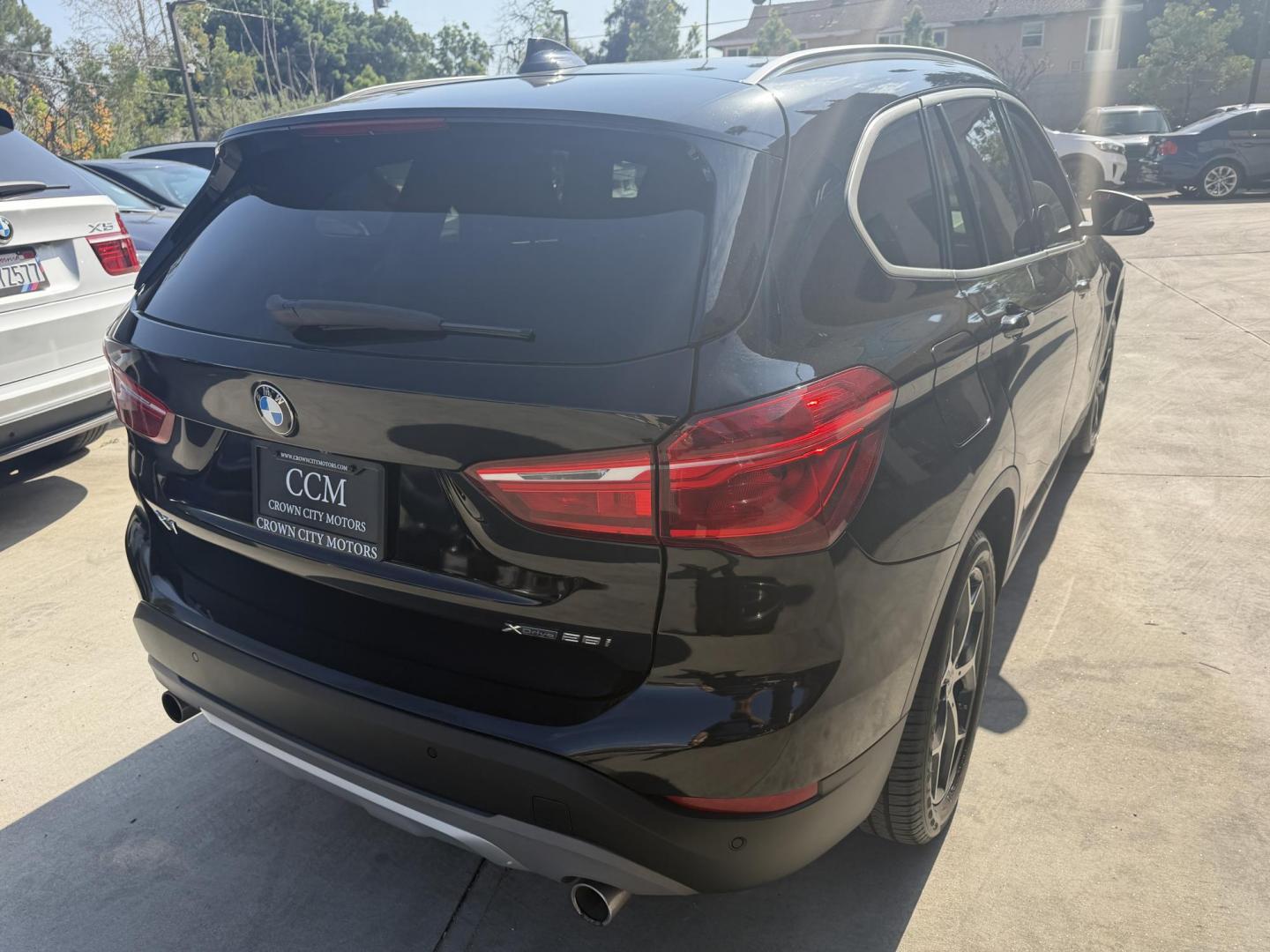 2018 Black /Black BMW X1 xDrive28i (WBXHT3C35J5) with an 2.0L L4 DOHC 16V engine, 8A transmission, located at 30 S. Berkeley Avenue, Pasadena, CA, 91107, (626) 248-7567, 34.145447, -118.109398 - BMW X1 – Black on Black – VIN: WBXHT3C35J5L28331 Luxury SUV with Buy Here Pay Here Financing – Crown City Motors, Pasadena If you’re looking for a luxury SUV with bad credit financing, this black on black BMW X3 is an excellent choice. Available now at Crown City Motors in Pasadena, th - Photo#4
