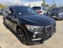 2018 Black /Black BMW X1 xDrive28i (WBXHT3C35J5) with an 2.0L L4 DOHC 16V engine, 8A transmission, located at 30 S. Berkeley Avenue, Pasadena, CA, 91107, (626) 248-7567, 34.145447, -118.109398 - BMW X1 – Black on Black – VIN: WBXHT3C35J5L28331 Luxury SUV with Buy Here Pay Here Financing – Crown City Motors, Pasadena If you’re looking for a luxury SUV with bad credit financing, this black on black BMW X3 is an excellent choice. Available now at Crown City Motors in Pasadena, th - Photo#6