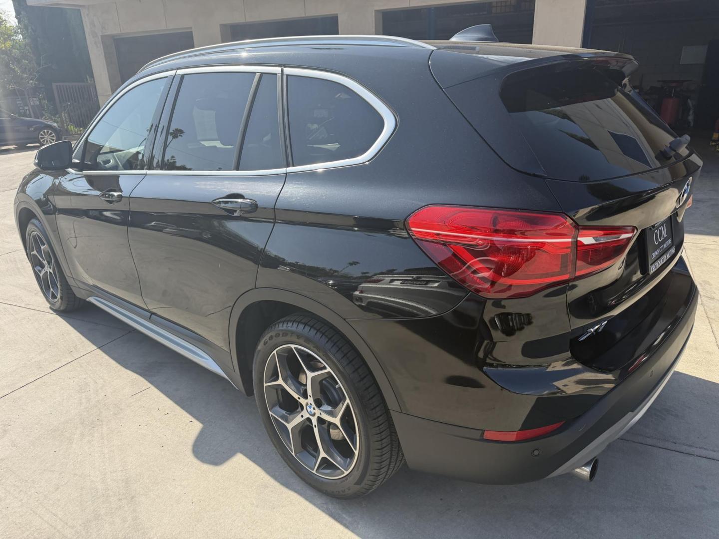 2018 Black /Black BMW X1 xDrive28i (WBXHT3C35J5) with an 2.0L L4 DOHC 16V engine, 8A transmission, located at 30 S. Berkeley Avenue, Pasadena, CA, 91107, (626) 248-7567, 34.145447, -118.109398 - BMW X1 – Black on Black – VIN: WBXHT3C35J5L28331 Luxury SUV with Buy Here Pay Here Financing – Crown City Motors, Pasadena If you’re looking for a luxury SUV with bad credit financing, this black on black BMW X3 is an excellent choice. Available now at Crown City Motors in Pasadena, th - Photo#10
