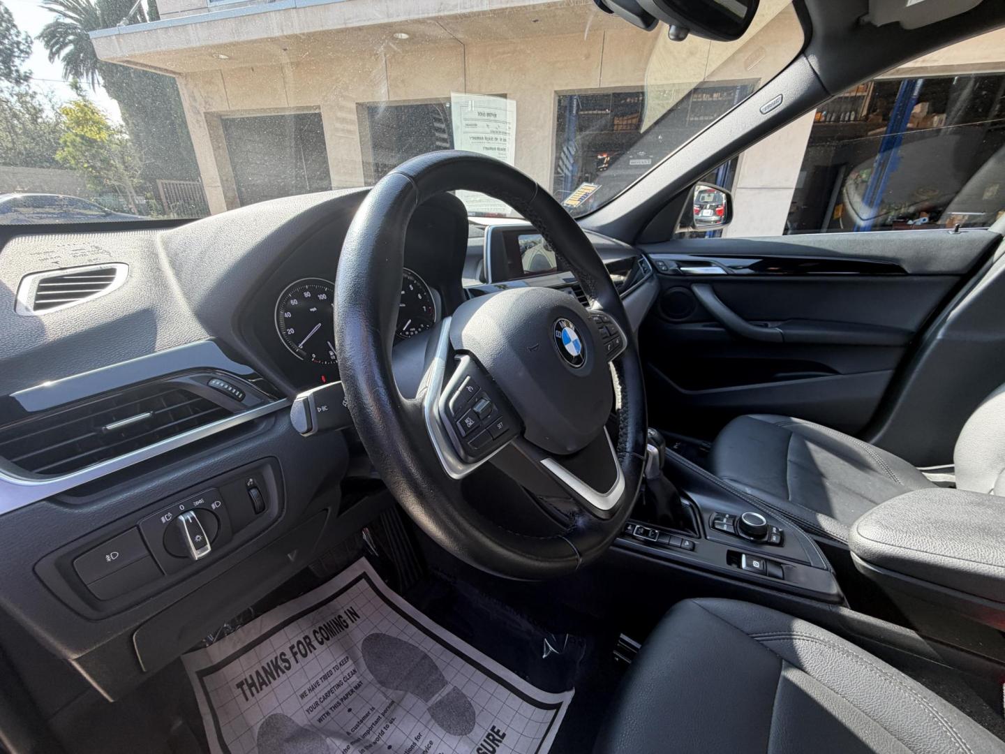 2018 Black /Black BMW X1 xDrive28i (WBXHT3C35J5) with an 2.0L L4 DOHC 16V engine, 8A transmission, located at 30 S. Berkeley Avenue, Pasadena, CA, 91107, (626) 248-7567, 34.145447, -118.109398 - BMW X1 – Black on Black – VIN: WBXHT3C35J5L28331 Luxury SUV with Buy Here Pay Here Financing – Crown City Motors, Pasadena If you’re looking for a luxury SUV with bad credit financing, this black on black BMW X3 is an excellent choice. Available now at Crown City Motors in Pasadena, th - Photo#17