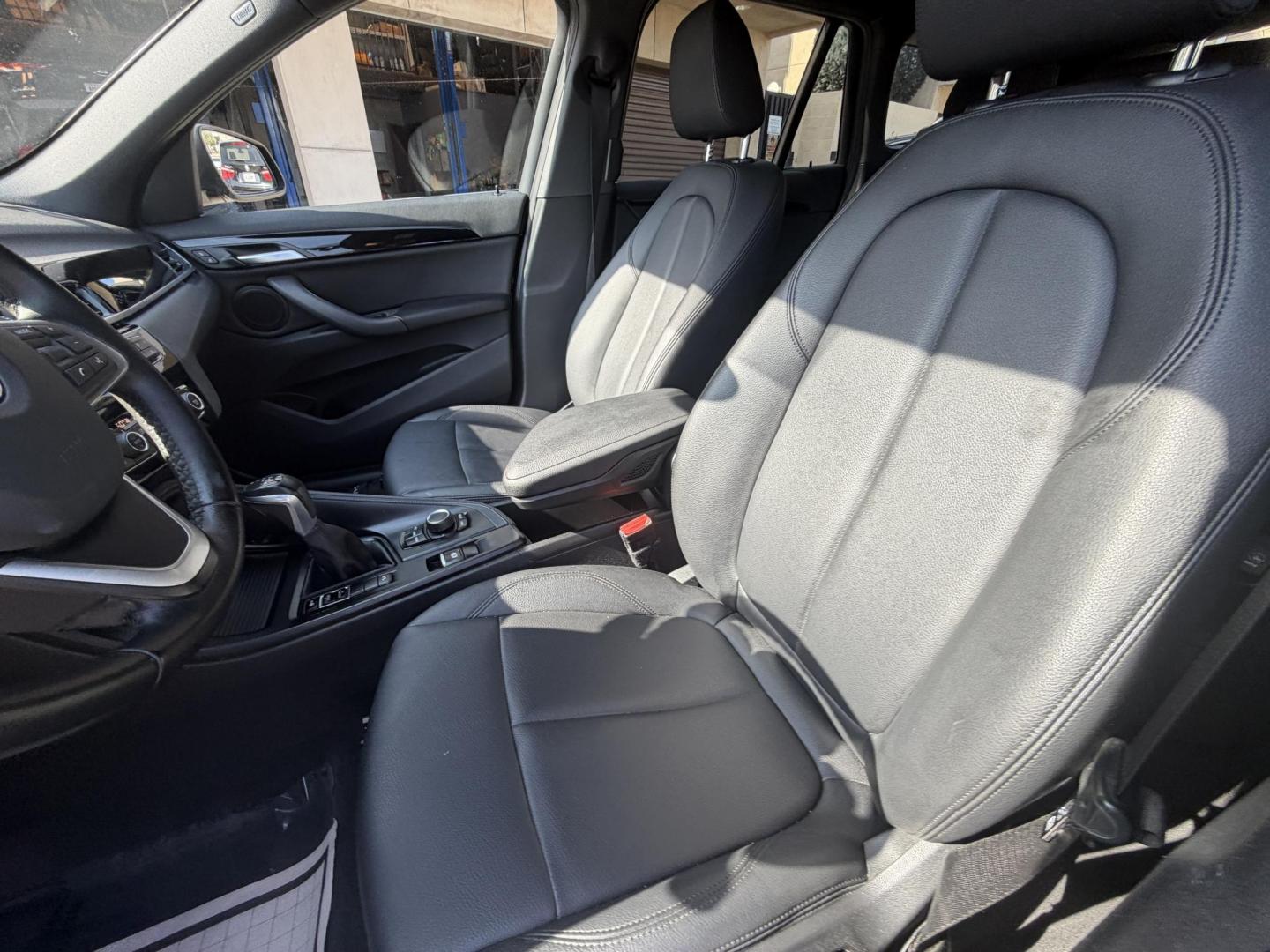 2018 Black /Black BMW X1 xDrive28i (WBXHT3C35J5) with an 2.0L L4 DOHC 16V engine, 8A transmission, located at 30 S. Berkeley Avenue, Pasadena, CA, 91107, (626) 248-7567, 34.145447, -118.109398 - BMW X1 – Black on Black – VIN: WBXHT3C35J5L28331 Luxury SUV with Buy Here Pay Here Financing – Crown City Motors, Pasadena If you’re looking for a luxury SUV with bad credit financing, this black on black BMW X3 is an excellent choice. Available now at Crown City Motors in Pasadena, th - Photo#20