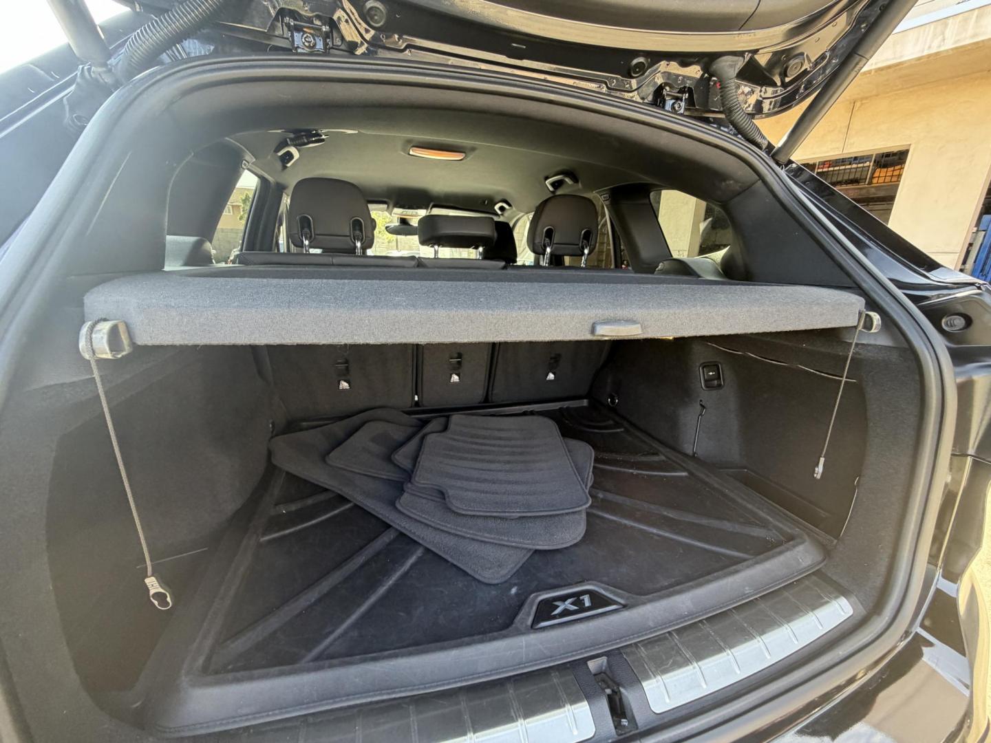 2018 Black /Black BMW X1 xDrive28i (WBXHT3C35J5) with an 2.0L L4 DOHC 16V engine, 8A transmission, located at 30 S. Berkeley Avenue, Pasadena, CA, 91107, (626) 248-7567, 34.145447, -118.109398 - BMW X1 – Black on Black – VIN: WBXHT3C35J5L28331 Luxury SUV with Buy Here Pay Here Financing – Crown City Motors, Pasadena If you’re looking for a luxury SUV with bad credit financing, this black on black BMW X3 is an excellent choice. Available now at Crown City Motors in Pasadena, th - Photo#23