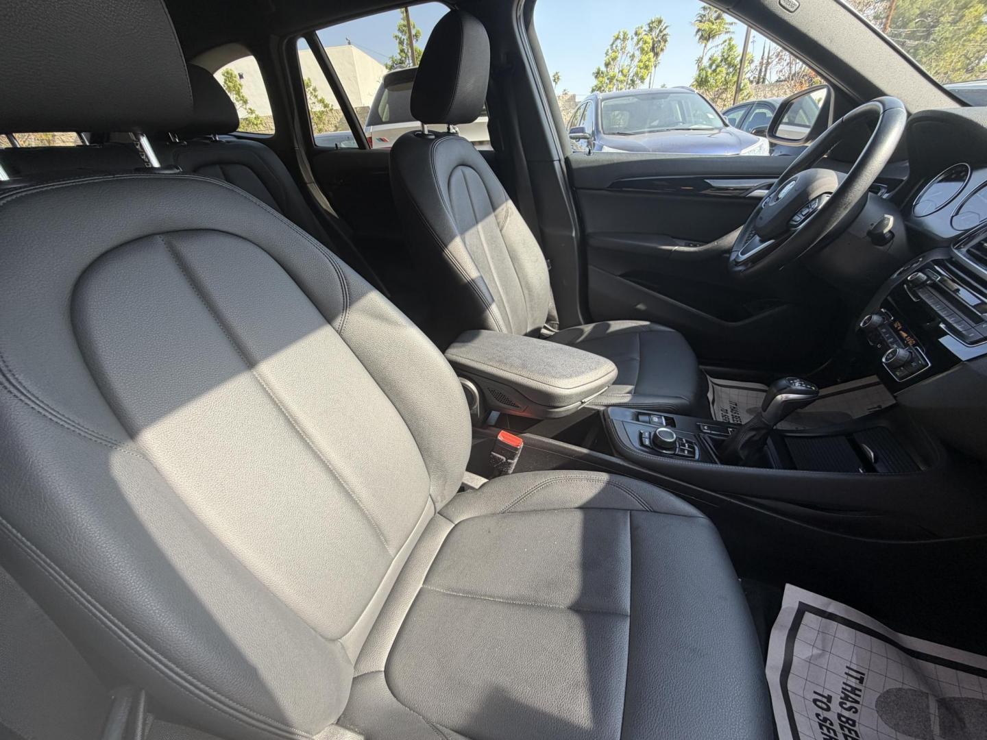2018 Black /Black BMW X1 xDrive28i (WBXHT3C35J5) with an 2.0L L4 DOHC 16V engine, 8A transmission, located at 30 S. Berkeley Avenue, Pasadena, CA, 91107, (626) 248-7567, 34.145447, -118.109398 - BMW X1 – Black on Black – VIN: WBXHT3C35J5L28331 Luxury SUV with Buy Here Pay Here Financing – Crown City Motors, Pasadena If you’re looking for a luxury SUV with bad credit financing, this black on black BMW X3 is an excellent choice. Available now at Crown City Motors in Pasadena, th - Photo#22