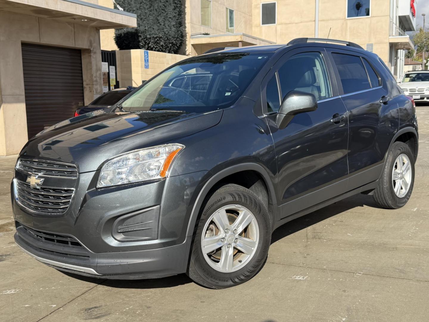 2016 Gray metallic /Black Chevrolet Trax LT AWD (3GNCJPSBXGL) with an 1.4L L4 DOHC 16V engine, 6A transmission, located at 30 S. Berkeley Avenue, Pasadena, CA, 91107, (626) 248-7567, 34.145447, -118.109398 - 2016 Chevrolet Equinox – Gray Exterior & Black Interior – VIN: 3GNCJPSBXGL218890 Reliable SUV with Buy Here Pay Here Financing – Crown City Motors, Pasadena Looking for a dependable SUV with flexible financing options? This 2016 Chevrolet Equinox finished in sleek gray with a black inter - Photo#1