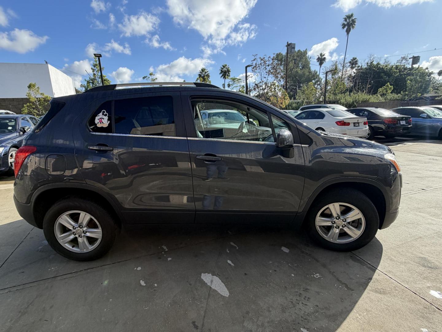 2016 Gray metallic /Black Chevrolet Trax LT AWD (3GNCJPSBXGL) with an 1.4L L4 DOHC 16V engine, 6A transmission, located at 30 S. Berkeley Avenue, Pasadena, CA, 91107, (626) 248-7567, 34.145447, -118.109398 - 2016 Chevrolet Equinox – Gray Exterior & Black Interior – VIN: 3GNCJPSBXGL218890 Reliable SUV with Buy Here Pay Here Financing – Crown City Motors, Pasadena Looking for a dependable SUV with flexible financing options? This 2016 Chevrolet Equinox finished in sleek gray with a black inter - Photo#7
