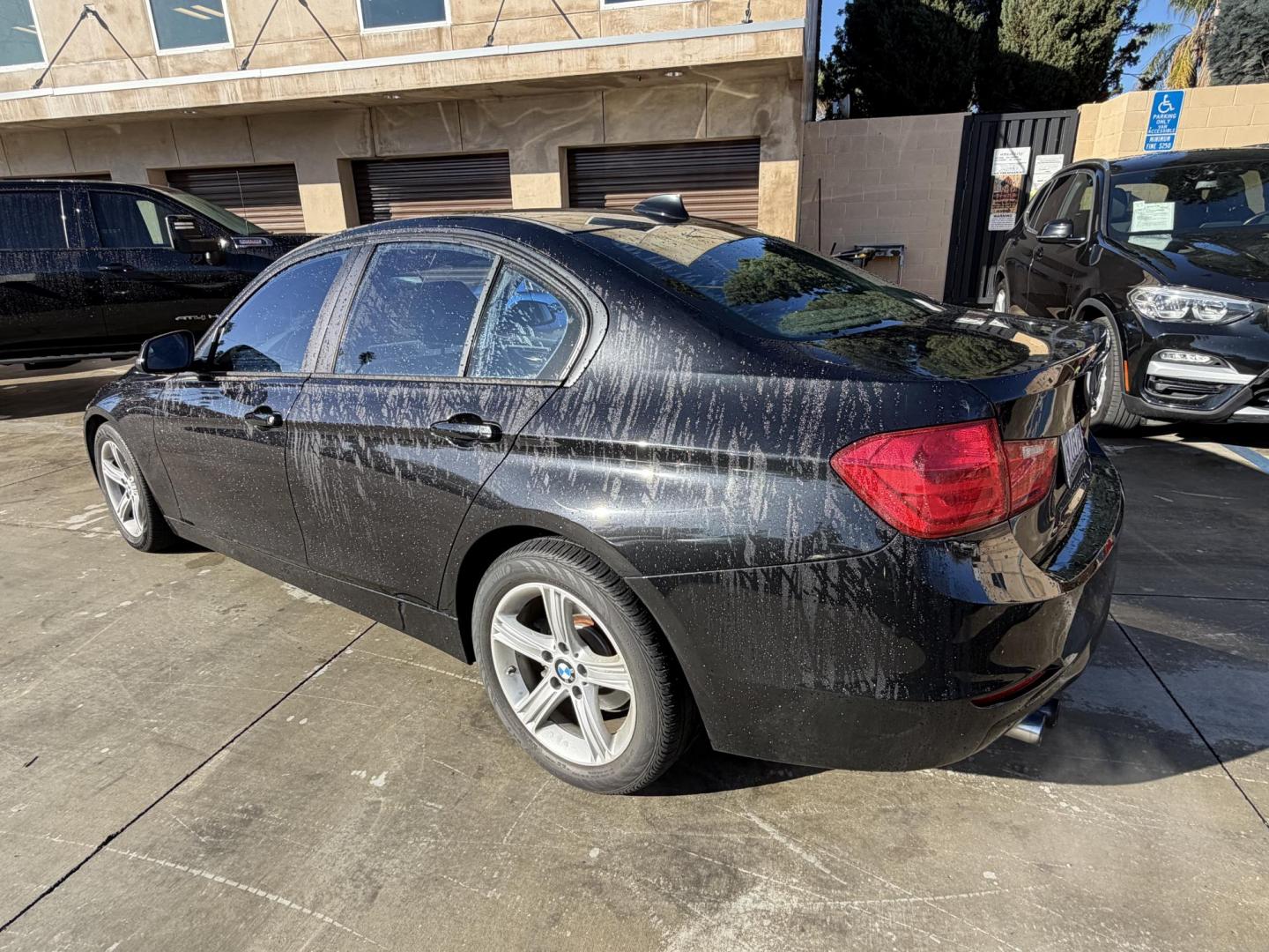 2012 BLACK /Black BMW 3-Series 328i Sedan (WBA3C1C51CF) with an 2.0L L4 DOHC 16V engine, located at 30 S. Berkeley Avenue, Pasadena, CA, 91107, (626) 248-7567, 34.145447, -118.109398 - This BMW 3 Series sedan offers the perfect blend of performance, comfort, and everyday usability. With only 82,000 miles, it has significantly lower mileage than average for its year, making it a smart option for buyers who want a well-maintained luxury vehicle. Highlights commonly associated wit - Photo#2