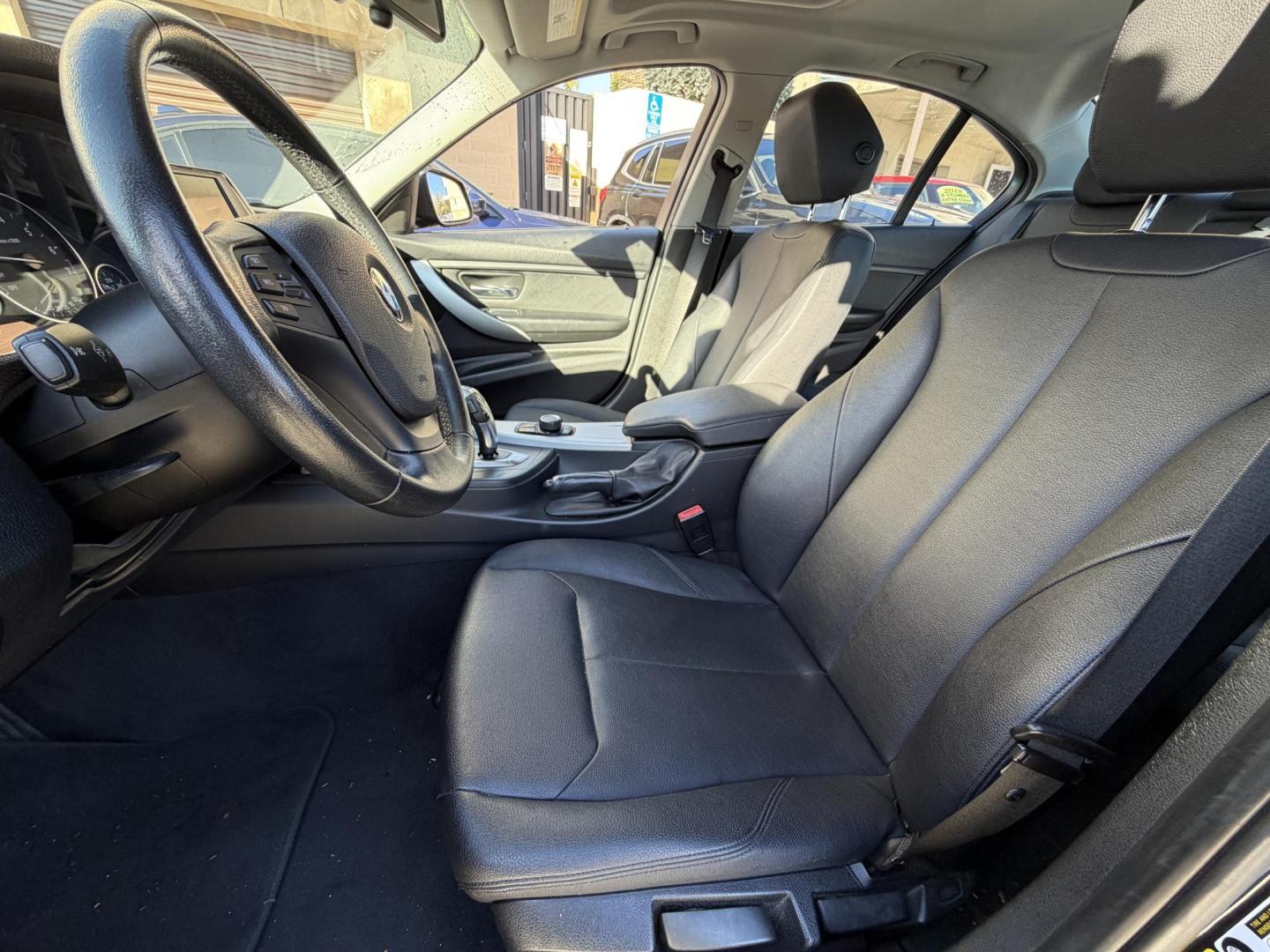 2012 BLACK /Black BMW 3-Series 328i Sedan (WBA3C1C51CF) with an 2.0L L4 DOHC 16V engine, located at 30 S. Berkeley Avenue, Pasadena, CA, 91107, (626) 248-7567, 34.145447, -118.109398 - This BMW 3 Series sedan offers the perfect blend of performance, comfort, and everyday usability. With only 82,000 miles, it has significantly lower mileage than average for its year, making it a smart option for buyers who want a well-maintained luxury vehicle. Highlights commonly associated wit - Photo#6