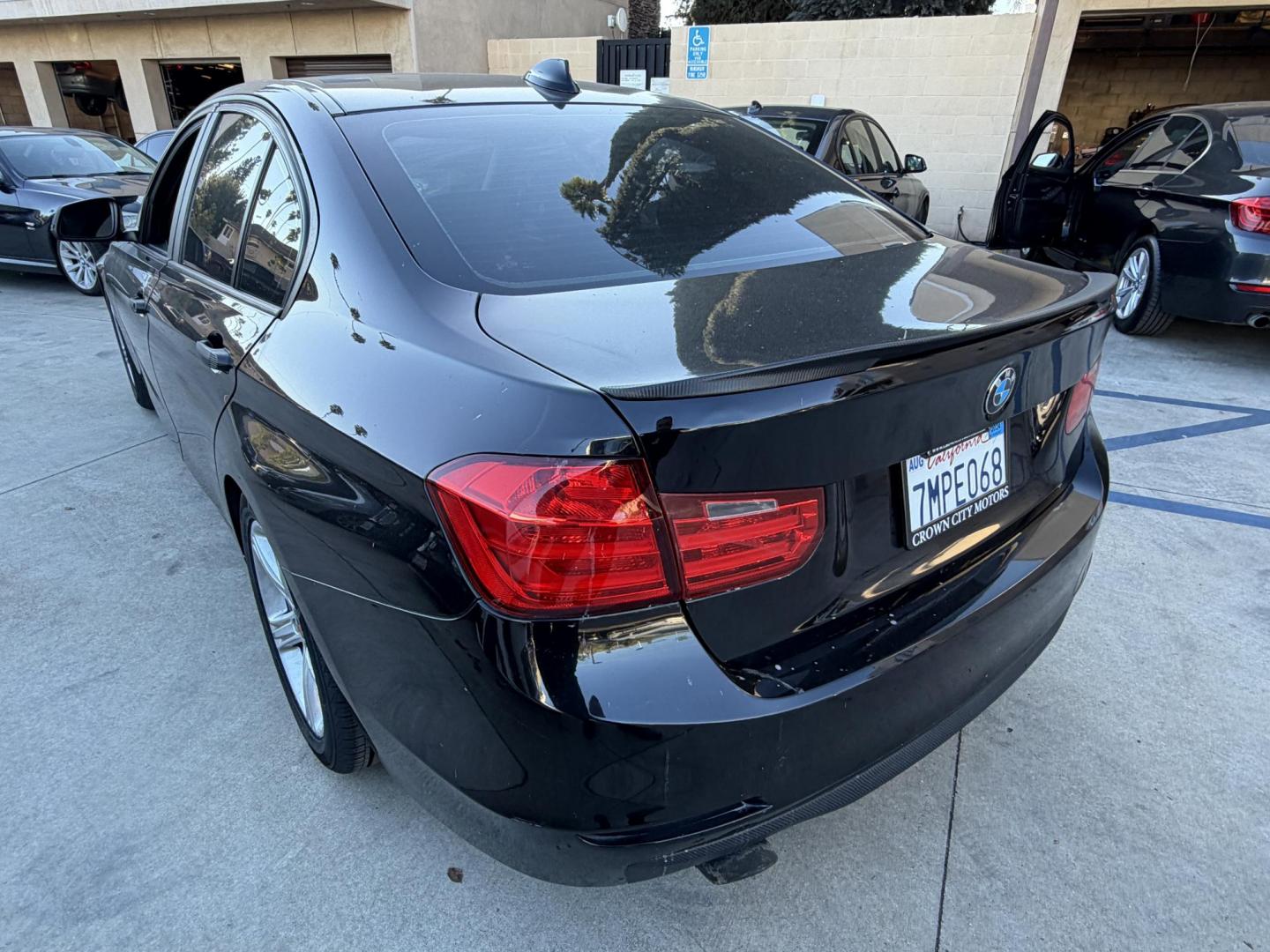 2012 BLACK /Black BMW 3-Series 328i Sedan (WBA3C1C51CF) with an 2.0L L4 DOHC 16V engine, located at 30 S. Berkeley Avenue, Pasadena, CA, 91107, (626) 248-7567, 34.145447, -118.109398 - This BMW 3 Series sedan offers the perfect blend of performance, comfort, and everyday usability. With only 82,000 miles, it has significantly lower mileage than average for its year, making it a smart option for buyers who want a well-maintained luxury vehicle. Highlights commonly associated wit - Photo#10