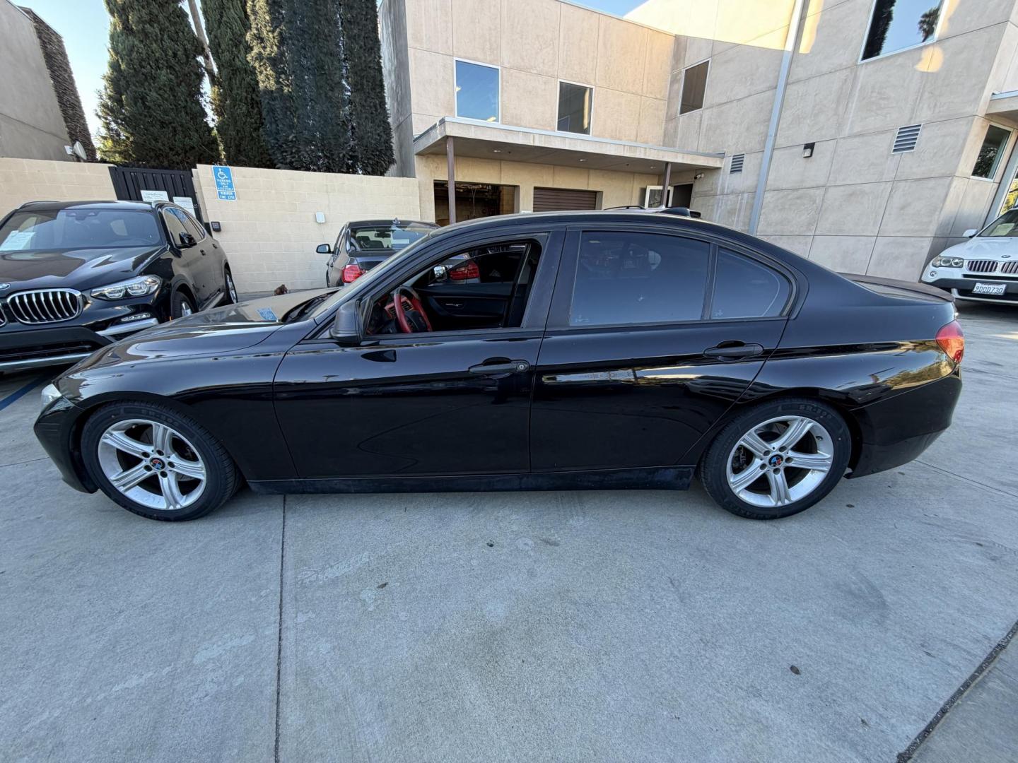 2012 BLACK /Black BMW 3-Series 328i Sedan (WBA3C1C51CF) with an 2.0L L4 DOHC 16V engine, located at 30 S. Berkeley Avenue, Pasadena, CA, 91107, (626) 248-7567, 34.145447, -118.109398 - This BMW 3 Series sedan offers the perfect blend of performance, comfort, and everyday usability. With only 82,000 miles, it has significantly lower mileage than average for its year, making it a smart option for buyers who want a well-maintained luxury vehicle. Highlights commonly associated wit - Photo#9