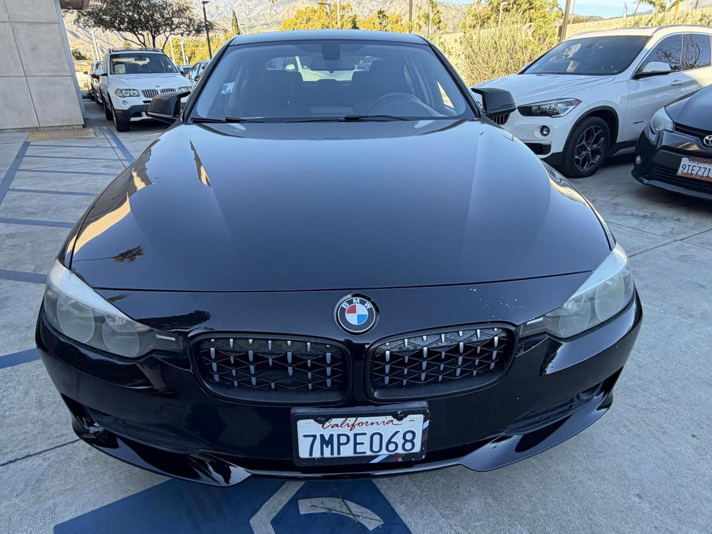 2015 BLACK /Black BMW 3-Series 320i Sedan (WBA3B1G58FN) with an 2.0L L4 DOHC 16V engine, 8-Speed Automatic transmission, located at 30 S. Berkeley Avenue, Pasadena, CA, 91107, (626) 248-7567, 34.145447, -118.109398 - This BMW 3 Series sedan offers an ideal balance of performance, comfort, and everyday usability. BMW engineered the 3 Series with a driver-focused cockpit, precise steering, and a suspension that delivers both sportiness and comfort. Highlights commonly associated with the BMW 3 Series include: - Photo#14