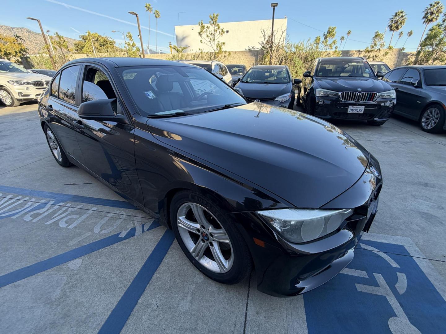 2015 BLACK /Black BMW 3-Series 320i Sedan (WBA3B1G58FN) with an 2.0L L4 DOHC 16V engine, 8-Speed Automatic transmission, located at 30 S. Berkeley Avenue, Pasadena, CA, 91107, (626) 248-7567, 34.145447, -118.109398 - This BMW 3 Series sedan offers an ideal balance of performance, comfort, and everyday usability. BMW engineered the 3 Series with a driver-focused cockpit, precise steering, and a suspension that delivers both sportiness and comfort. Highlights commonly associated with the BMW 3 Series include: - Photo#15
