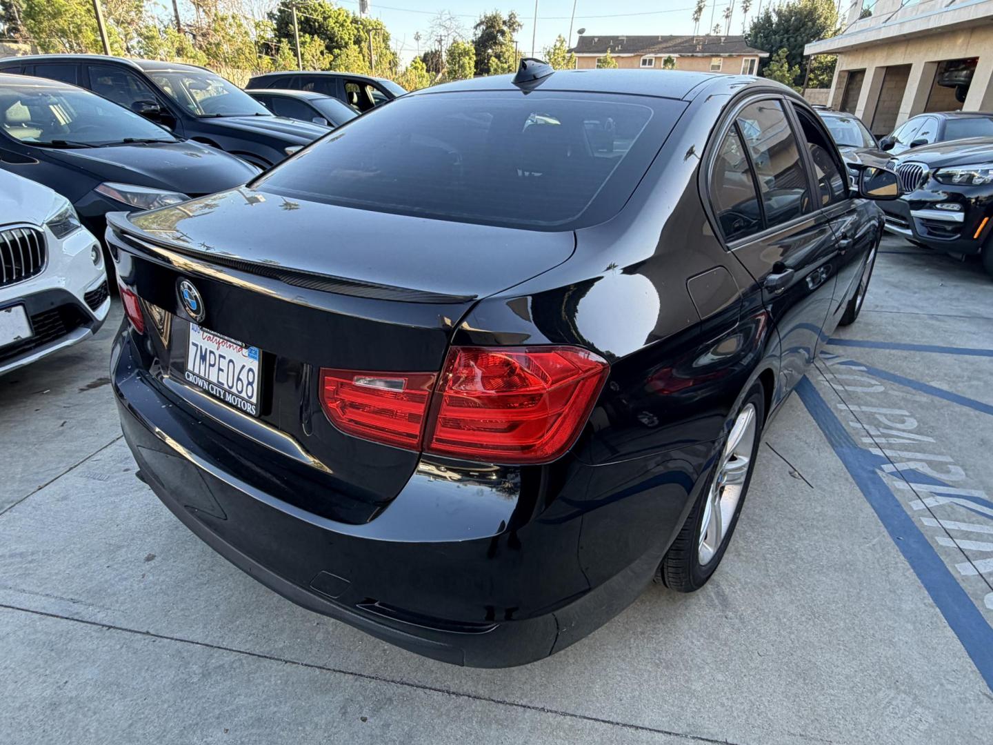 2015 BLACK /Black BMW 3-Series 320i Sedan (WBA3B1G58FN) with an 2.0L L4 DOHC 16V engine, 8-Speed Automatic transmission, located at 30 S. Berkeley Avenue, Pasadena, CA, 91107, (626) 248-7567, 34.145447, -118.109398 - This BMW 3 Series sedan offers an ideal balance of performance, comfort, and everyday usability. BMW engineered the 3 Series with a driver-focused cockpit, precise steering, and a suspension that delivers both sportiness and comfort. Highlights commonly associated with the BMW 3 Series include: - Photo#17