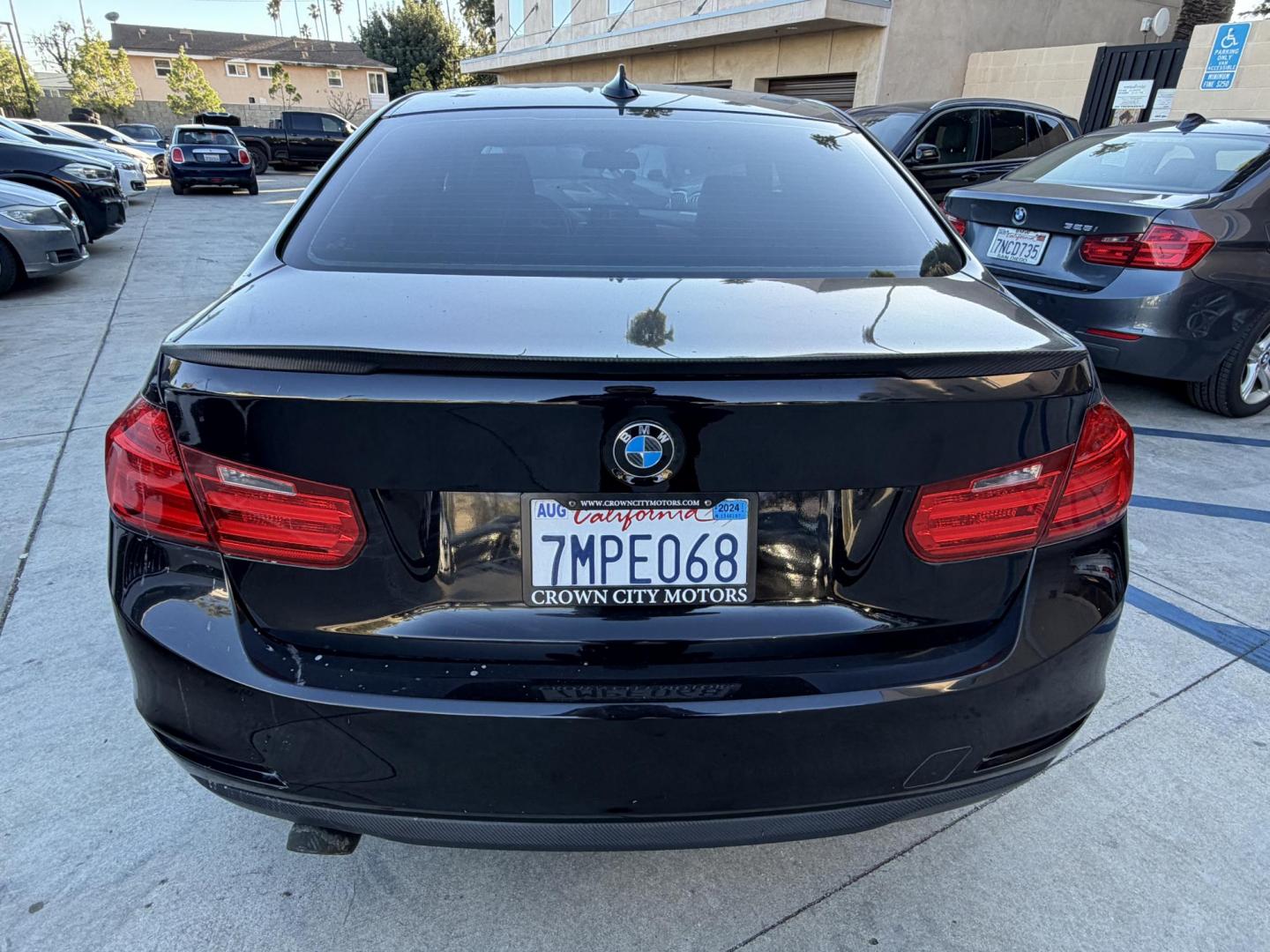 2015 BLACK /Black BMW 3-Series 320i Sedan (WBA3B1G58FN) with an 2.0L L4 DOHC 16V engine, 8-Speed Automatic transmission, located at 30 S. Berkeley Avenue, Pasadena, CA, 91107, (626) 248-7567, 34.145447, -118.109398 - This BMW 3 Series sedan offers an ideal balance of performance, comfort, and everyday usability. BMW engineered the 3 Series with a driver-focused cockpit, precise steering, and a suspension that delivers both sportiness and comfort. Highlights commonly associated with the BMW 3 Series include: - Photo#18