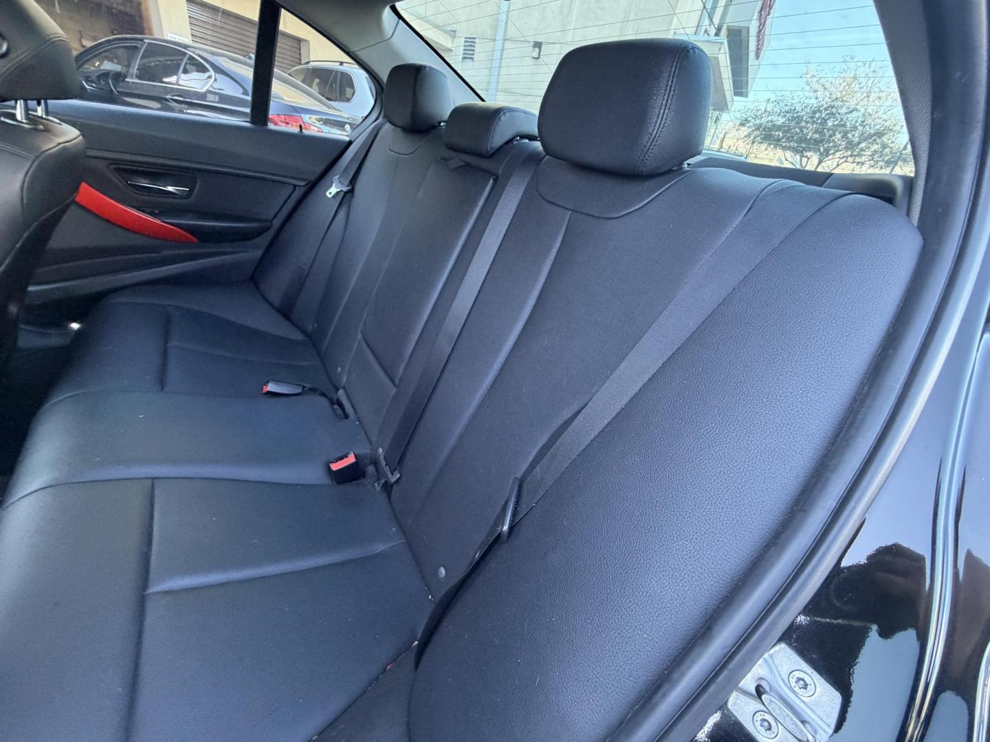 2015 BLACK /Black BMW 3-Series 320i Sedan (WBA3B1G58FN) with an 2.0L L4 DOHC 16V engine, 8-Speed Automatic transmission, located at 30 S. Berkeley Avenue, Pasadena, CA, 91107, (626) 248-7567, 34.145447, -118.109398 - This BMW 3 Series sedan offers an ideal balance of performance, comfort, and everyday usability. BMW engineered the 3 Series with a driver-focused cockpit, precise steering, and a suspension that delivers both sportiness and comfort. Highlights commonly associated with the BMW 3 Series include: - Photo#25