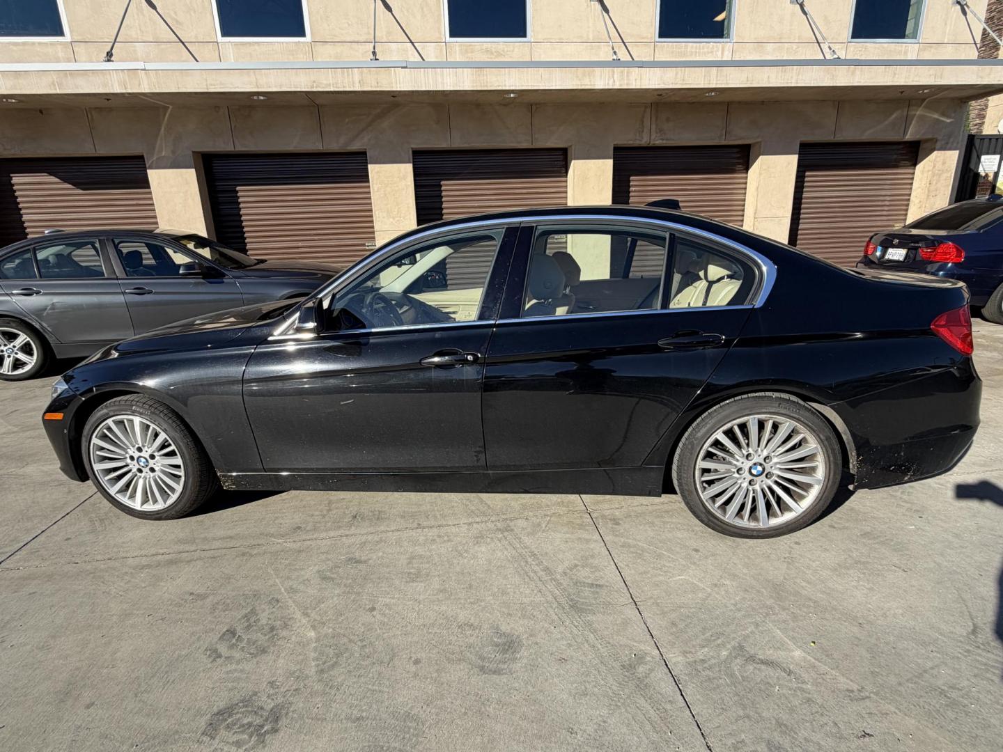 2014 Black /BEIGE BMW 3-Series 328i Sedan (WBA3C1C58EK) with an 2.0L L4 DOHC 16V engine, located at 30 S. Berkeley Avenue, Pasadena, CA, 91107, (626) 248-7567, 34.145447, -118.109398 - Crown City Motors is a used “Buy Here Pay Here” car dealer in Pasadena CA. “Buy Here Pay Here” financing, means that when you purchase your vehicle from our dealership, that you make the payments to the dealership as well. We do not need the banks approval to get you approved for a used auto - Photo#1