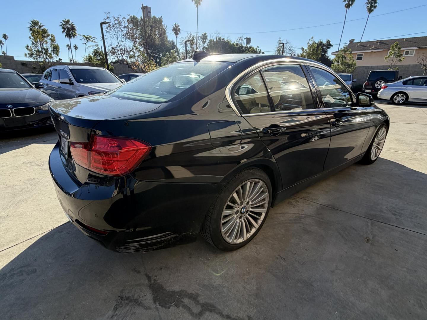 2014 Black /BEIGE BMW 3-Series 328i Sedan (WBA3C1C58EK) with an 2.0L L4 DOHC 16V engine, located at 30 S. Berkeley Avenue, Pasadena, CA, 91107, (626) 248-7567, 34.145447, -118.109398 - Crown City Motors is a used “Buy Here Pay Here” car dealer in Pasadena CA. “Buy Here Pay Here” financing, means that when you purchase your vehicle from our dealership, that you make the payments to the dealership as well. We do not need the banks approval to get you approved for a used auto - Photo#3