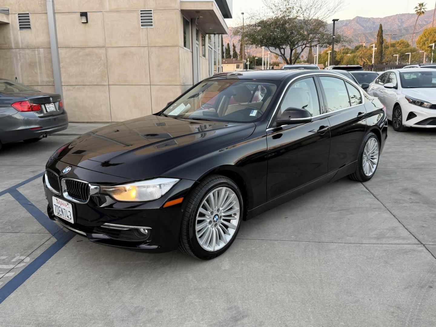 2014 Black /BEIGE BMW 3-Series 328i Sedan (WBA3C1C58EK) with an 2.0L L4 DOHC 16V engine, located at 30 S. Berkeley Avenue, Pasadena, CA, 91107, (626) 248-7567, 34.145447, -118.109398 - Crown City Motors is a used “Buy Here Pay Here” car dealer in Pasadena CA. “Buy Here Pay Here” financing, means that when you purchase your vehicle from our dealership, that you make the payments to the dealership as well. We do not need the banks approval to get you approved for a used auto - Photo#4