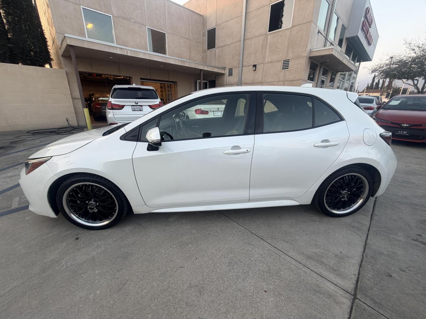 2019 White /BLACK Toyota Corolla L CVT (JTNK4RBE1K3) with an 1.8L L4 DOHC 16V engine, CVT transmission, located at 30 S. Berkeley Avenue, Pasadena, CA, 91107, (626) 248-7567, 34.145447, -118.109398 - Crown City Motors is a used “Buy Here Pay Here” car dealer in Pasadena CA. “Buy Here Pay Here” financing, means that when you purchase your vehicle from our dealership, that you make the payments to the dealership as well. We do not need the banks approval to get you approved for a used auto - Photo#8