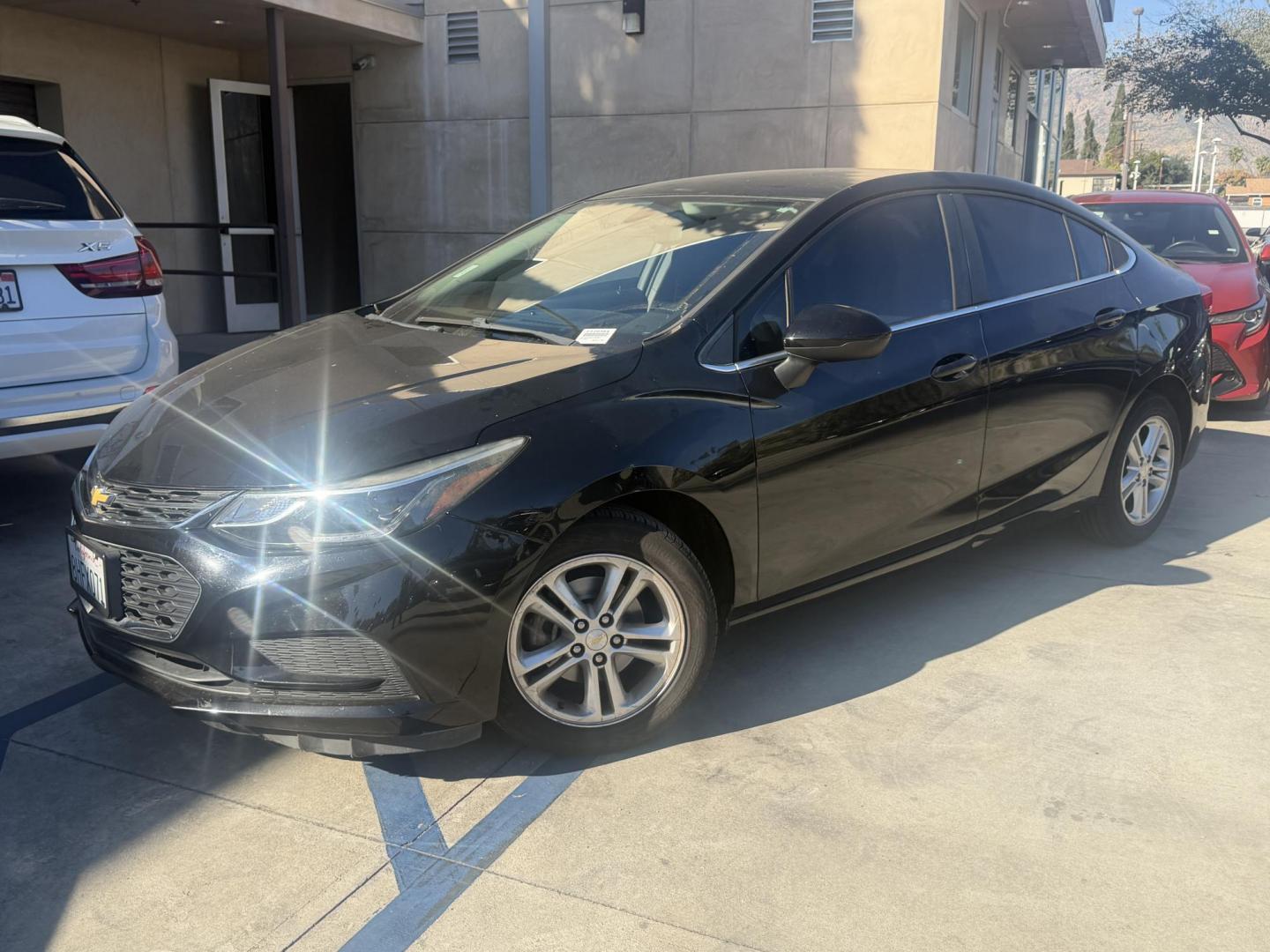 2018 Chevrolet Cruze LT Auto (1G1BE5SM4J7) with an 1.4L L4 DOHC 16V TURBO engine, 6A transmission, located at 30 S. Berkeley Avenue, Pasadena, CA, 91107, (626) 248-7567, 34.145447, -118.109398 - Photo#1