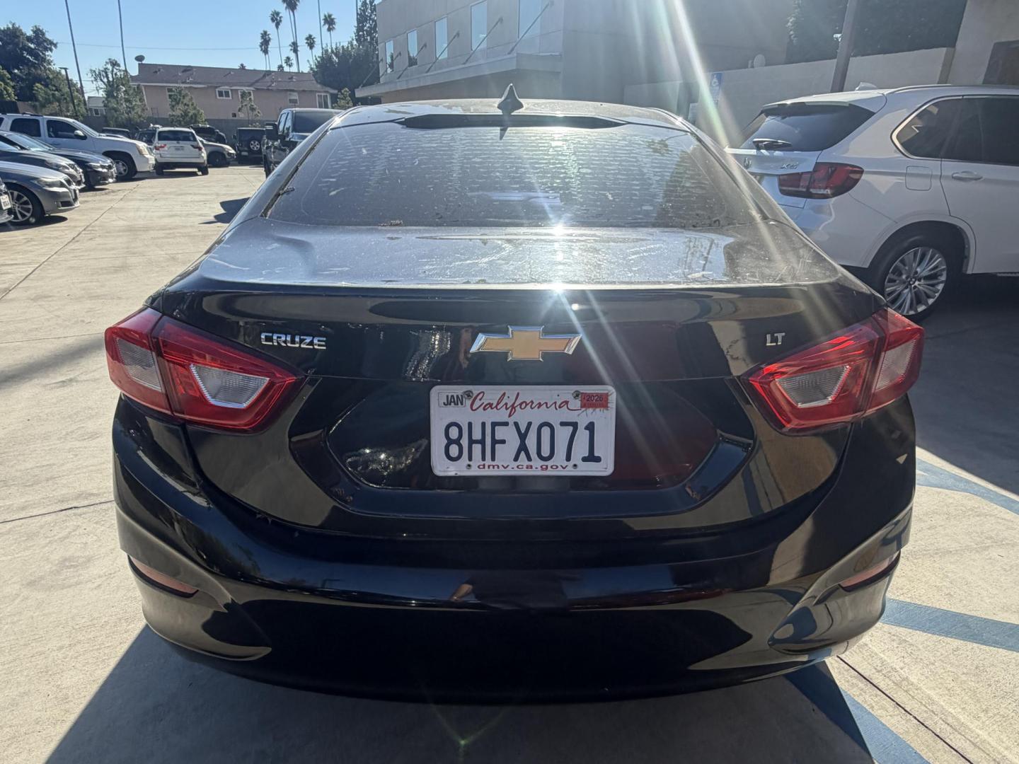 2018 Chevrolet Cruze LT Auto (1G1BE5SM4J7) with an 1.4L L4 DOHC 16V TURBO engine, 6A transmission, located at 30 S. Berkeley Avenue, Pasadena, CA, 91107, (626) 248-7567, 34.145447, -118.109398 - Photo#4