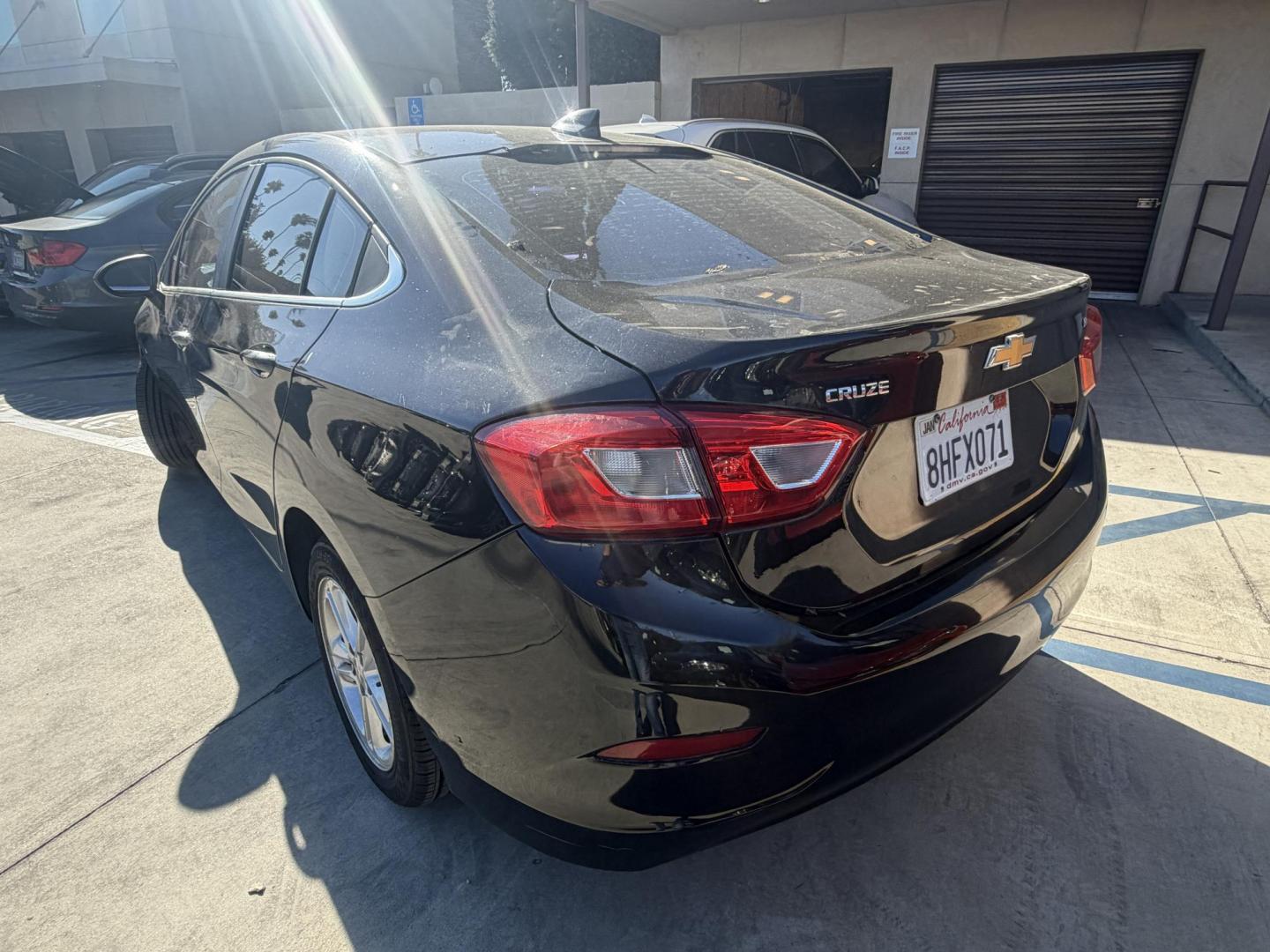2018 Chevrolet Cruze LT Auto (1G1BE5SM4J7) with an 1.4L L4 DOHC 16V TURBO engine, 6A transmission, located at 30 S. Berkeley Avenue, Pasadena, CA, 91107, (626) 248-7567, 34.145447, -118.109398 - Photo#3