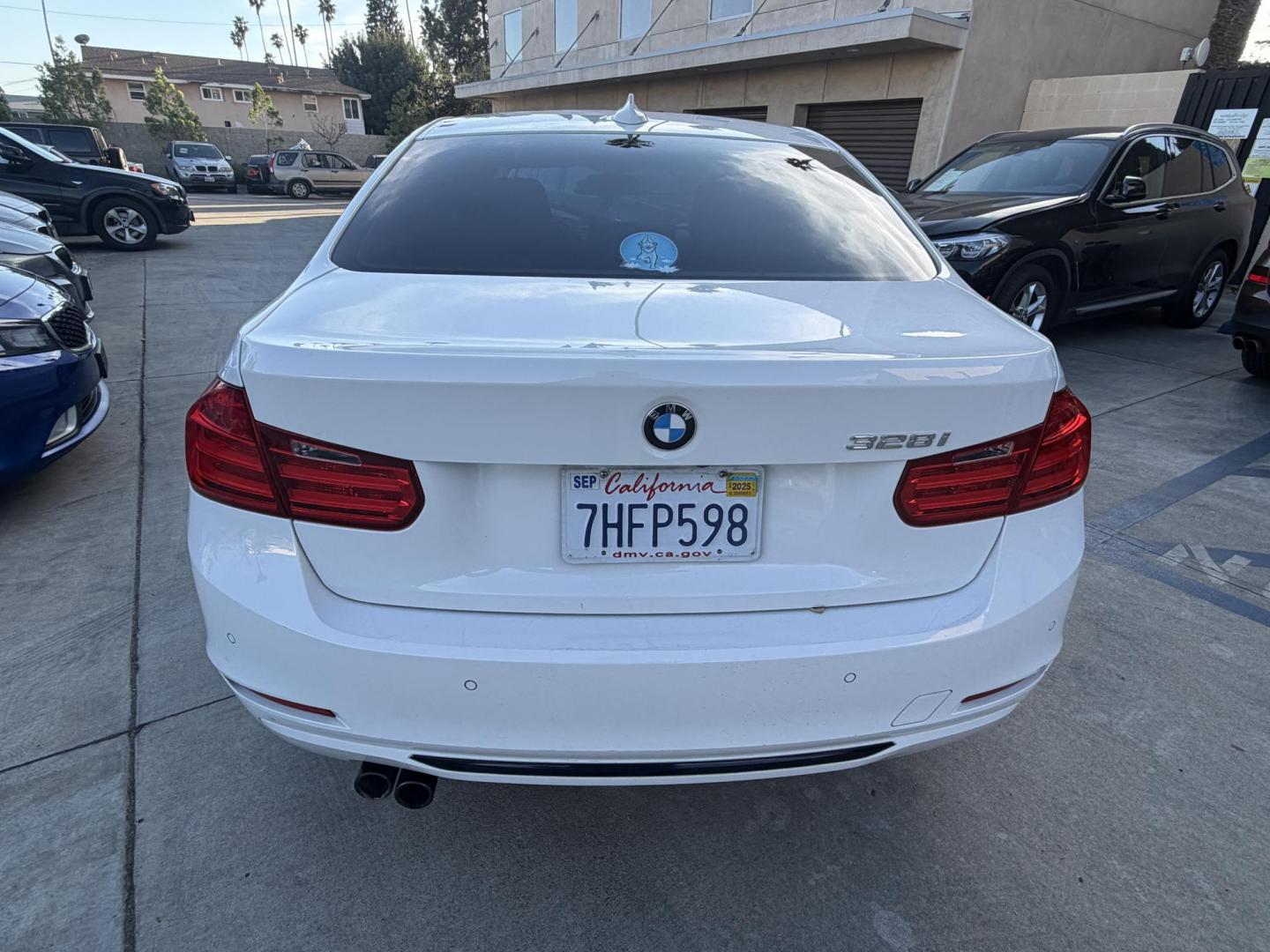 2014 BMW 3-Series 328i Sedan (WBA3C1C54EK) with an 2.0L L4 DOHC 16V engine, located at 30 S. Berkeley Avenue, Pasadena, CA, 91107, (626) 248-7567, 34.145447, -118.109398 - Crown City Motors is a used “Buy Here Pay Here” car dealer in Pasadena CA. “Buy Here Pay Here” financing, means that when you purchase your vehicle from our dealership, that you make the payments to the dealership as well. We do not need the banks approval to get you approved for a used auto - Photo#3