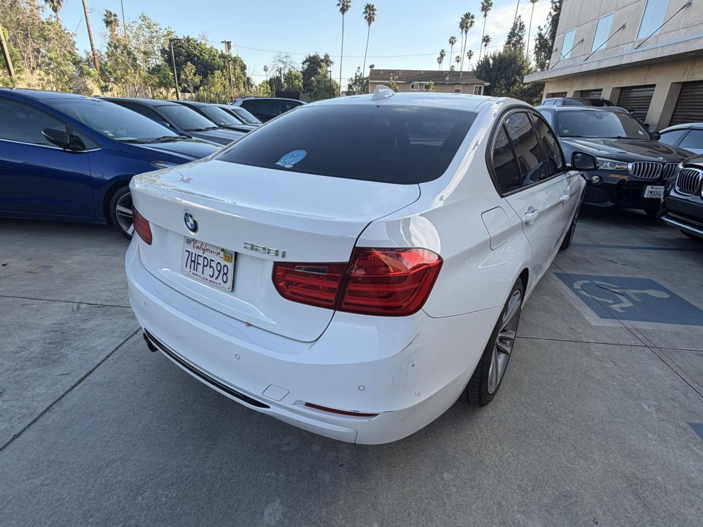 2014 BMW 3-Series 328i Sedan (WBA3C1C54EK) with an 2.0L L4 DOHC 16V engine, located at 30 S. Berkeley Avenue, Pasadena, CA, 91107, (626) 248-7567, 34.145447, -118.109398 - Crown City Motors is a used “Buy Here Pay Here” car dealer in Pasadena CA. “Buy Here Pay Here” financing, means that when you purchase your vehicle from our dealership, that you make the payments to the dealership as well. We do not need the banks approval to get you approved for a used auto - Photo#4