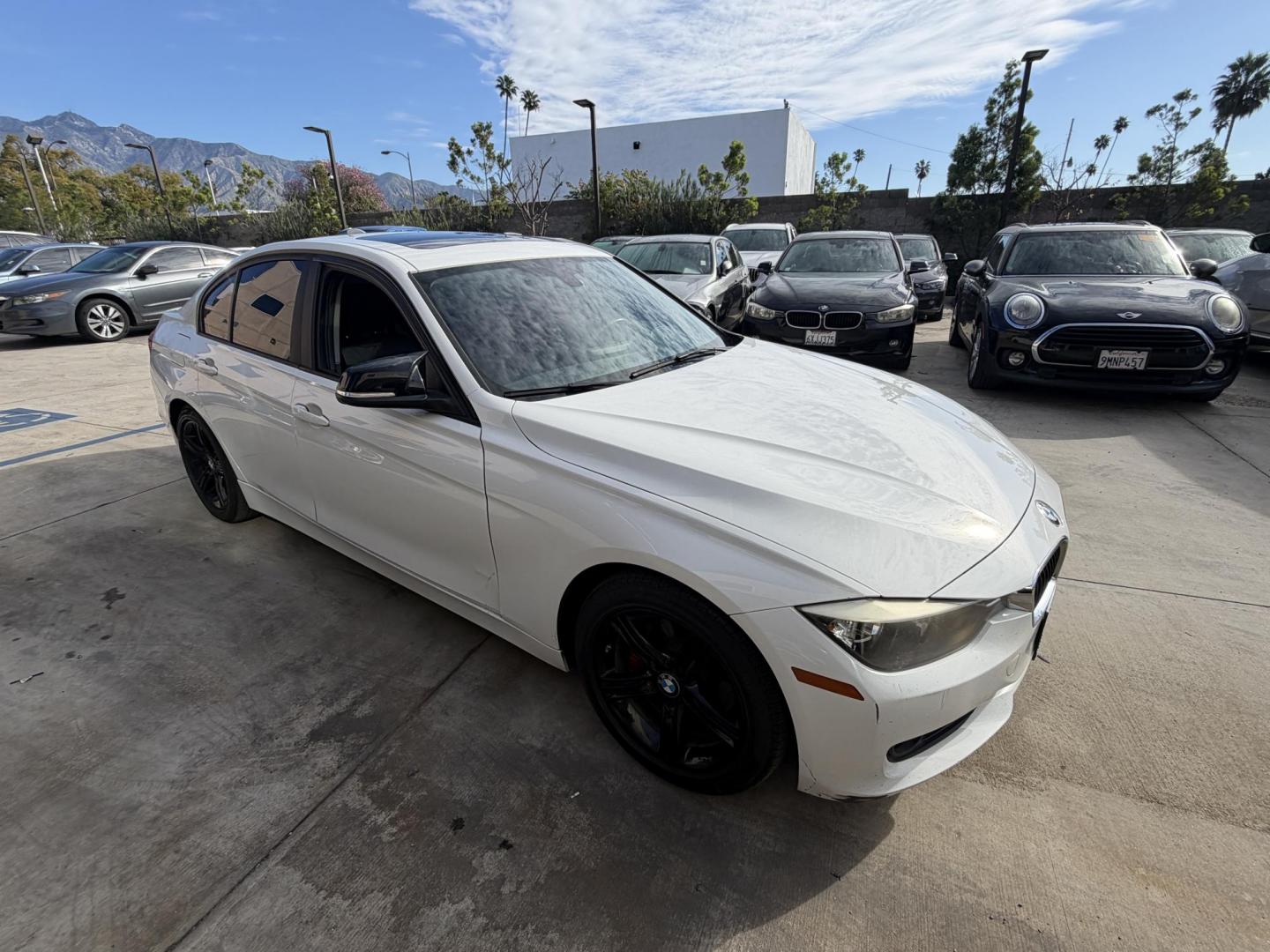 2014 White /Black BMW 3-Series 328i Sedan (WBA3C1C55EK) with an 2.0L L4 DOHC 16V engine, located at 30 S. Berkeley Avenue, Pasadena, CA, 91107, (626) 248-7567, 34.145447, -118.109398 - Crown City Motors is a used “Buy Here Pay Here” car dealer in Pasadena CA. “Buy Here Pay Here” financing, means that when you purchase your vehicle from our dealership, that you make the payments to the dealership as well. We do not need the banks approval to get you approved for a used auto - Photo#3