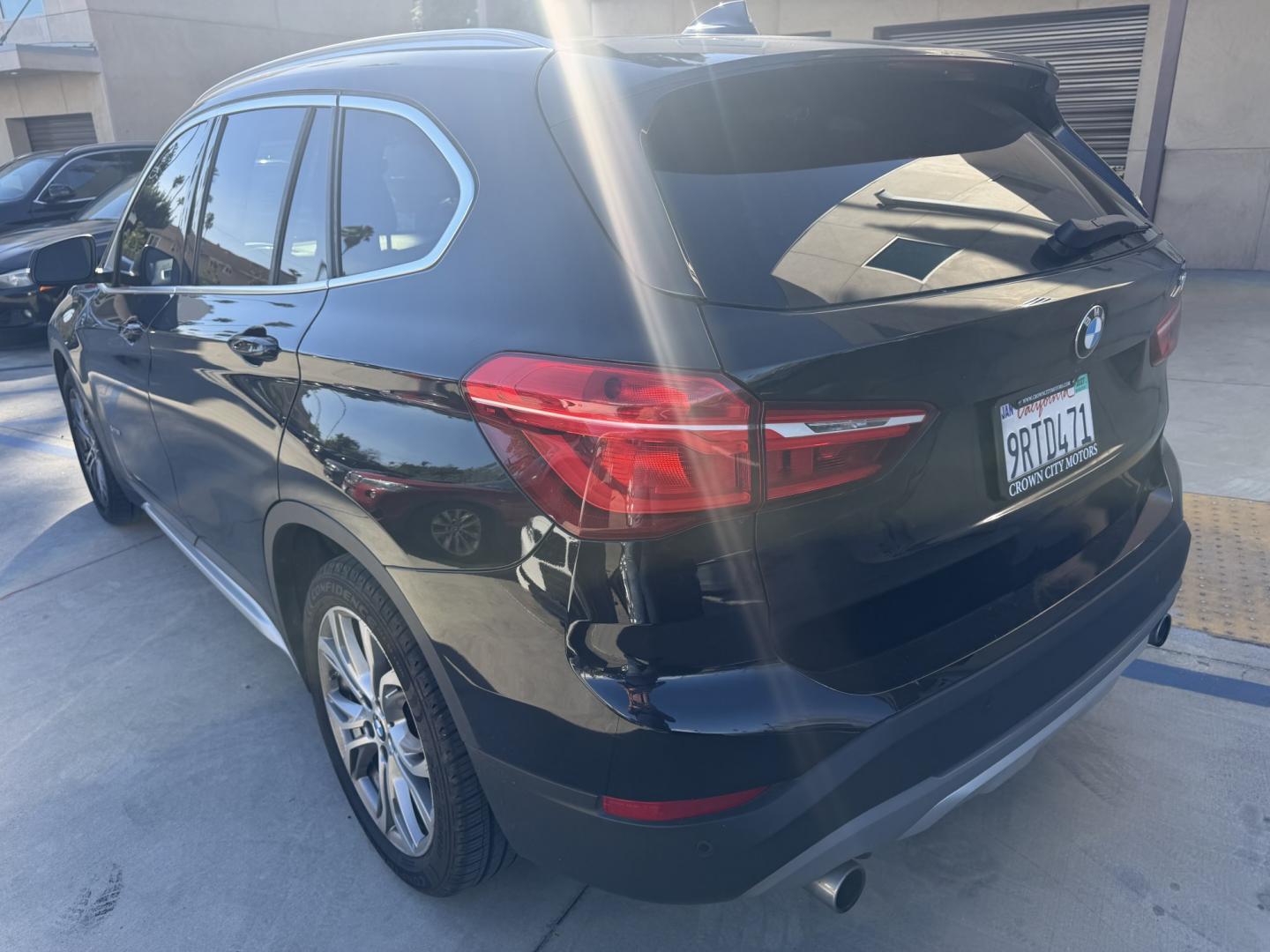 2016 Black /BLACK BMW X1 xDrive28i (WBXHT3Z30G4) with an 2.0L L4 DOHC 16V engine, 8A transmission, located at 30 S. Berkeley Avenue, Pasadena, CA, 91107, (626) 248-7567, 34.145447, -118.109398 - 2016 BMW X1 – Low Miles (79,000) – Buy Here Pay Here Financing – Pasadena, CA Looking for a BMW with low miles and easy financing in Pasadena? This 2016 BMW X1 (VIN: WBXHT3Z30G4A49250) has only 79,000 miles, making it an excellent choice for drivers who want luxury, reliability, and afforda - Photo#4