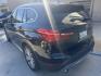 2016 Black /BLACK BMW X1 xDrive28i (WBXHT3Z30G4) with an 2.0L L4 DOHC 16V engine, 8A transmission, located at 30 S. Berkeley Avenue, Pasadena, CA, 91107, (626) 248-7567, 34.145447, -118.109398 - 2016 BMW X1 – Low Miles (79,000) – Buy Here Pay Here Financing – Pasadena, CA Looking for a BMW with low miles and easy financing in Pasadena? This 2016 BMW X1 (VIN: WBXHT3Z30G4A49250) has only 79,000 miles, making it an excellent choice for drivers who want luxury, reliability, and afforda - Photo#4