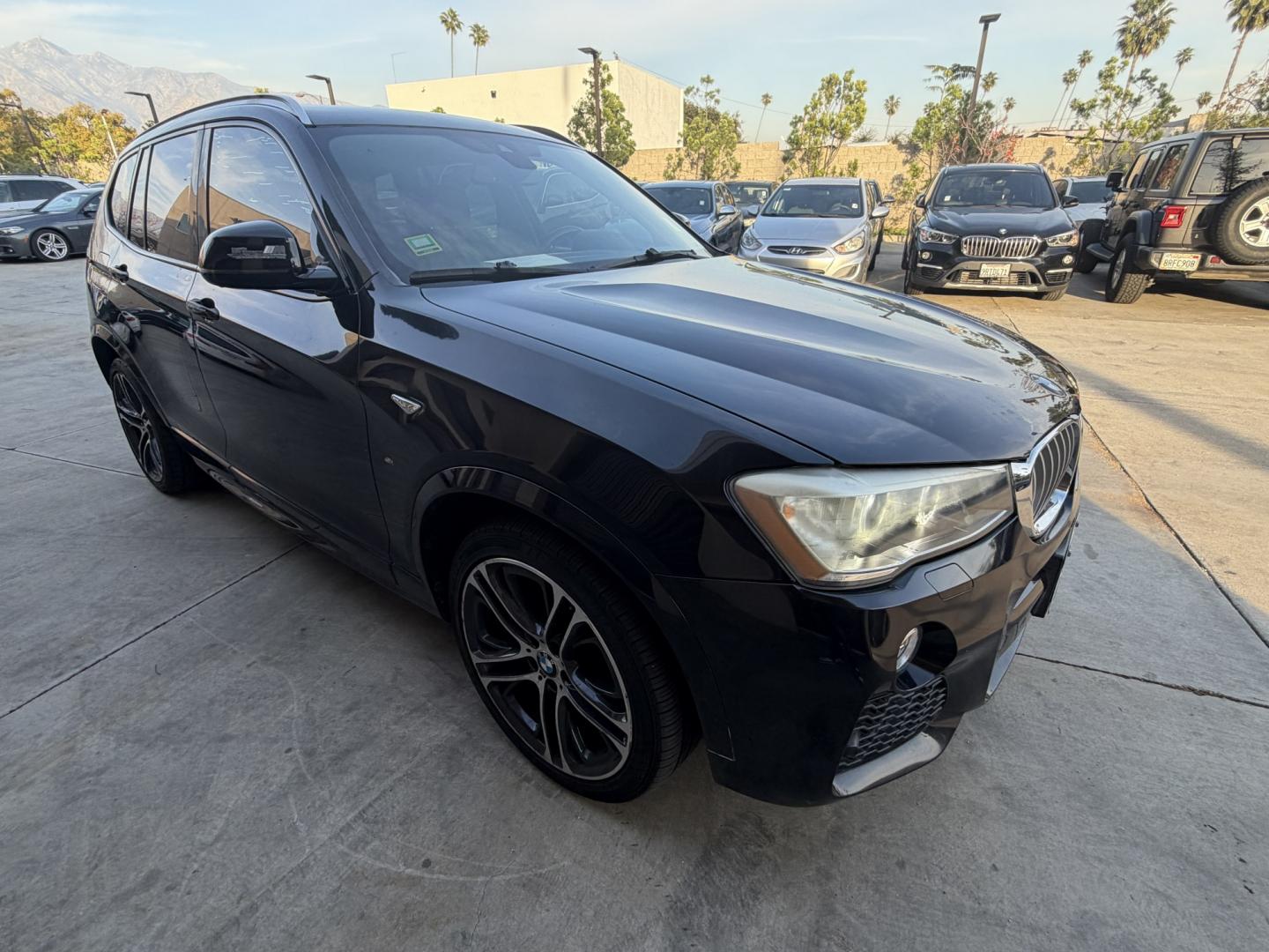 2016 Black /black BMW X3 xDrive28i (5UXWX9C53G0) with an 2.0L L4 DOHC 16V engine, 8-Speed Automatic transmission, located at 30 S. Berkeley Avenue, Pasadena, CA, 91107, (626) 248-7567, 34.145447, -118.109398 - Crown City Motors is a used “Buy Here Pay Here” car dealer in Pasadena CA. “Buy Here Pay Here” financing, means that when you purchase your vehicle from our dealership, that you make the payments to the dealership as well. We do not need the banks approval to get you approved for a used auto - Photo#6