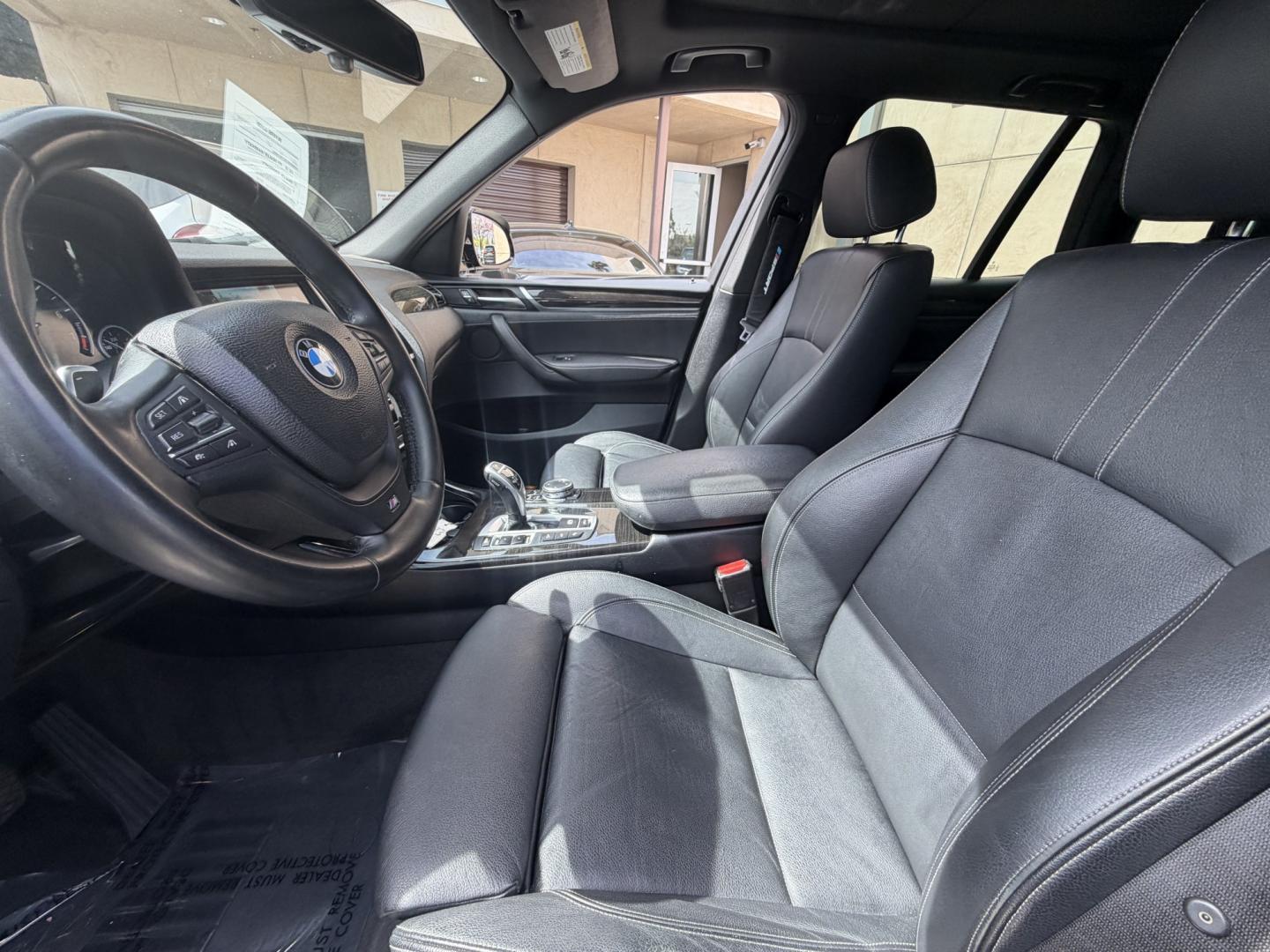 2016 Black /black BMW X3 xDrive28i (5UXWX9C53G0) with an 2.0L L4 DOHC 16V engine, 8-Speed Automatic transmission, located at 30 S. Berkeley Avenue, Pasadena, CA, 91107, (626) 248-7567, 34.145447, -118.109398 - Crown City Motors is a used “Buy Here Pay Here” car dealer in Pasadena CA. “Buy Here Pay Here” financing, means that when you purchase your vehicle from our dealership, that you make the payments to the dealership as well. We do not need the banks approval to get you approved for a used auto - Photo#25