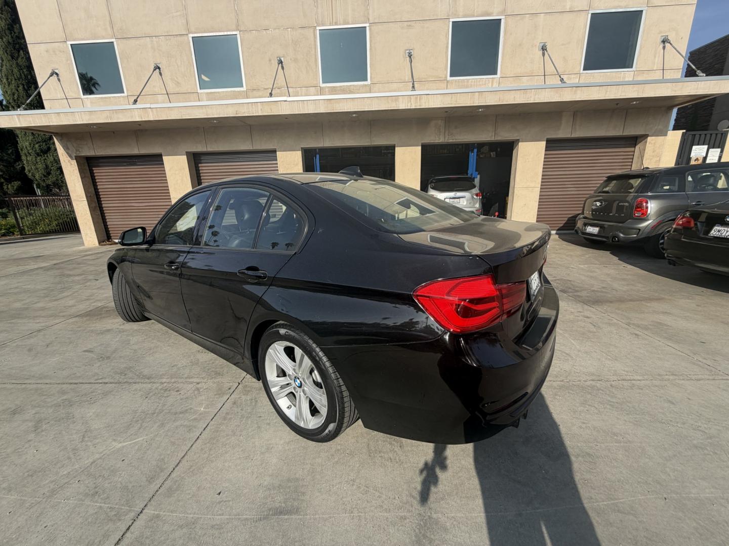 2016 Black /Black BMW 3-Series 328i Sedan (WBA8E9C58GK) with an 2.0L L4 DOHC 16V engine, 8A transmission, located at 30 S. Berkeley Avenue, Pasadena, CA, 91107, (626) 248-7567, 34.145447, -118.109398 - ooking for Buy Here Pay Here financing in Pasadena, CA? This 2016 BMW 328i (VIN: WBA8E9C58GK644731) is available now at Crown City Motors with in-house financing options for all credit types. If you have bad credit, no credit, repossessions, or prior bankruptcies, we specialize in getting you approv - Photo#2