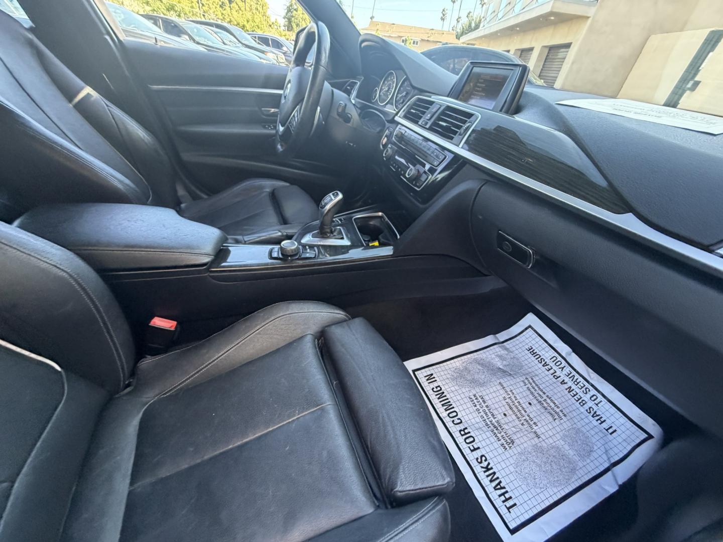 2016 Black /Black BMW 3-Series 328i Sedan (WBA8E9C58GK) with an 2.0L L4 DOHC 16V engine, 8A transmission, located at 30 S. Berkeley Avenue, Pasadena, CA, 91107, (626) 248-7567, 34.145447, -118.109398 - ooking for Buy Here Pay Here financing in Pasadena, CA? This 2016 BMW 328i (VIN: WBA8E9C58GK644731) is available now at Crown City Motors with in-house financing options for all credit types. If you have bad credit, no credit, repossessions, or prior bankruptcies, we specialize in getting you approv - Photo#9
