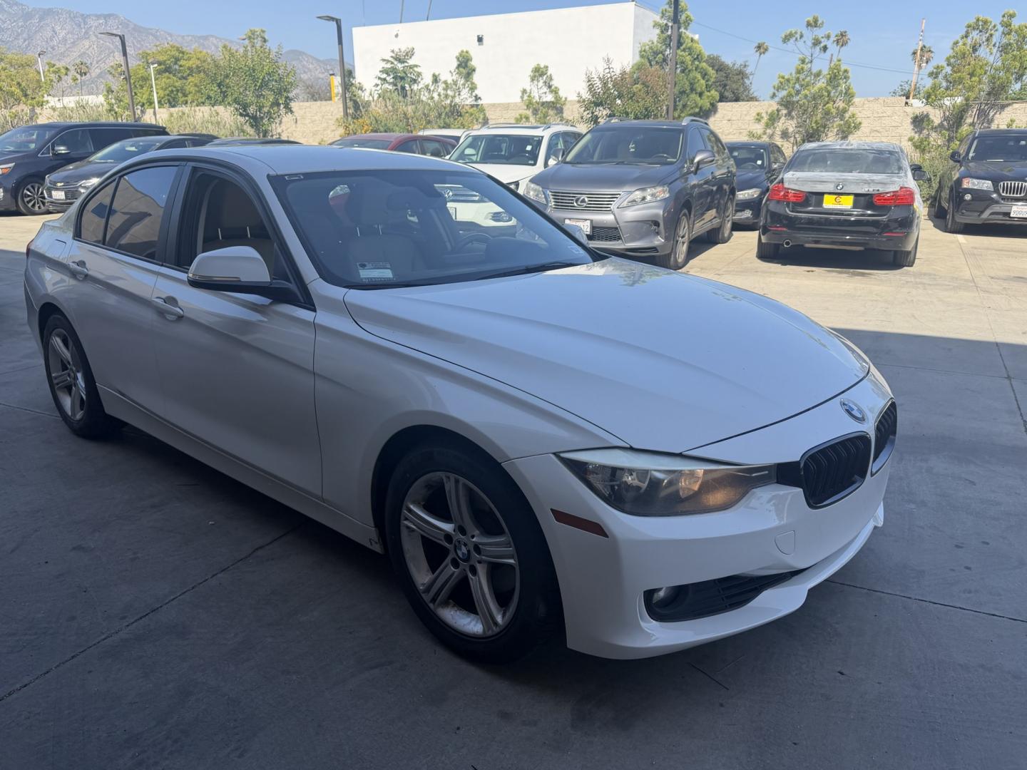 2014 Alpine White /Black BMW 3-Series 328i Sedan (WBA3C1C51EK) with an 2.0L L4 DOHC 16V engine, Automatic transmission, located at 30 S. Berkeley Avenue, Pasadena, CA, 91107, (626) 248-7567, 34.145447, -118.109398 - Drive a 2014 BMW 3 Series Today – Luxury, Performance & Easy Financing at Crown City Motors If you’re looking for a vehicle that perfectly blends luxury, performance, and everyday reliability, this 2014 BMW 3 Series is exactly what you need. Known worldwide for its engineering excellence, the - Photo#7